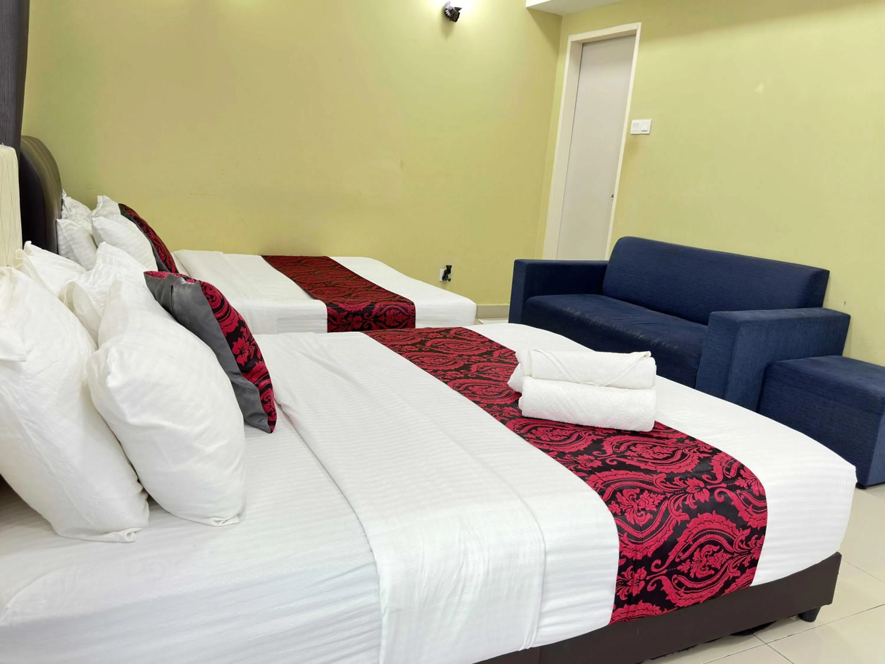 Seating area, Bed in Cahaya Qaira Homestay @ D'Perdana Kota Bharu