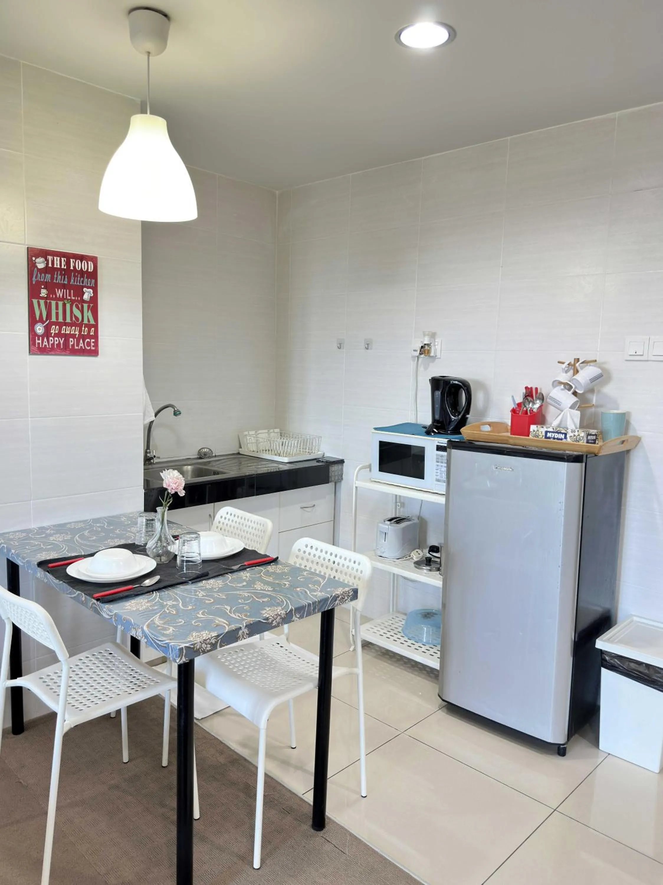 Kitchen or kitchenette in Cahaya Qaira Homestay @ D'Perdana Kota Bharu