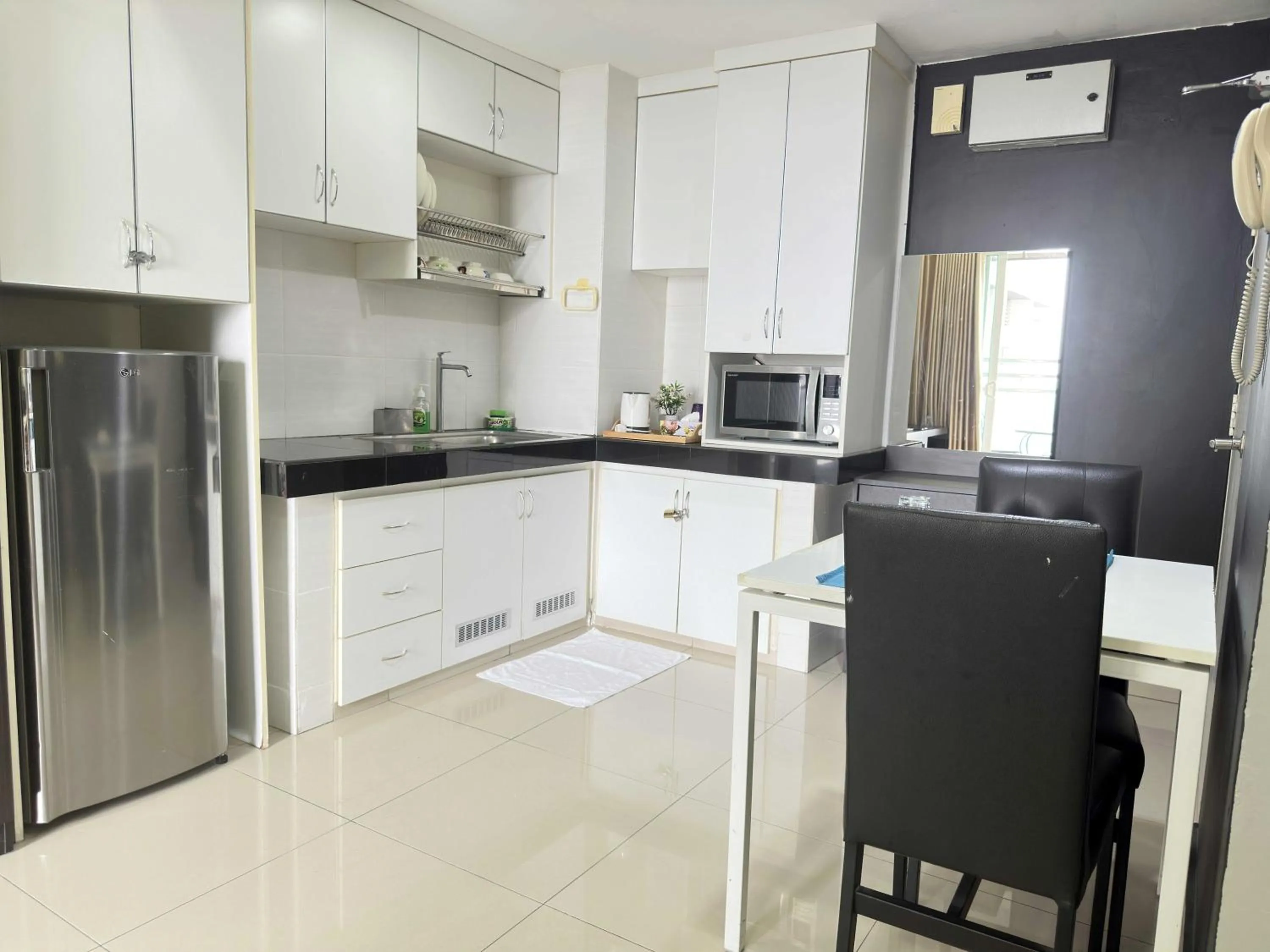 Kitchen or kitchenette in Cahaya Qaira Homestay @ D'Perdana Kota Bharu