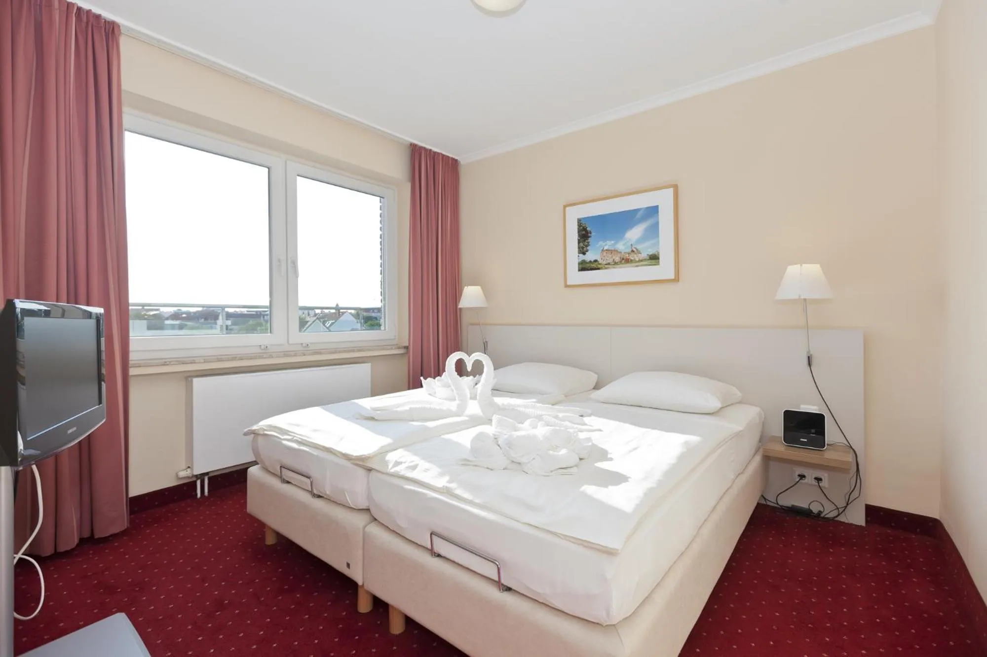 Photo of the whole room, Bed in Michels Hanseatic Hotel Norderney