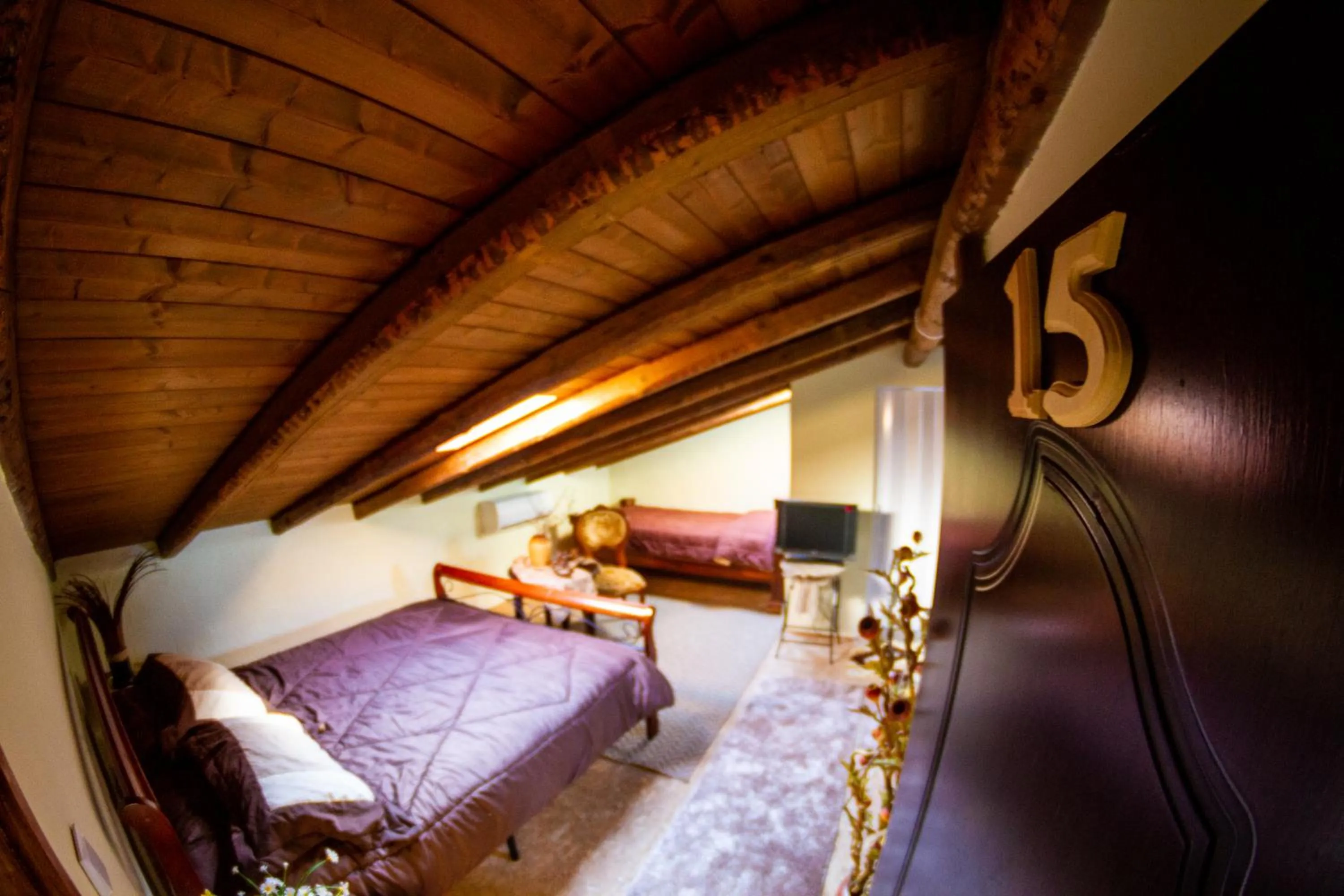 Bed in La Moara Boutique Hotel