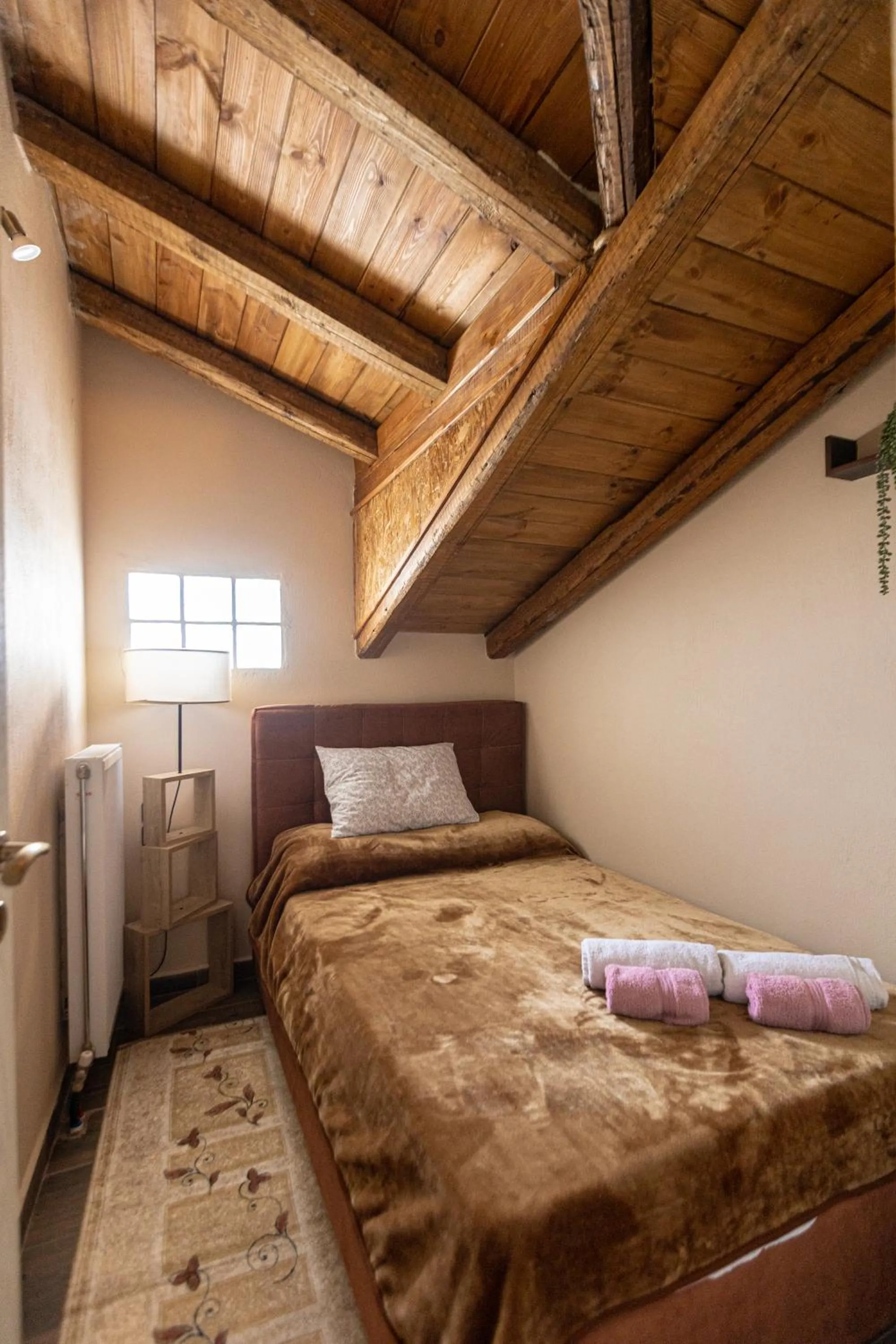 Bed in La Moara Boutique Hotel