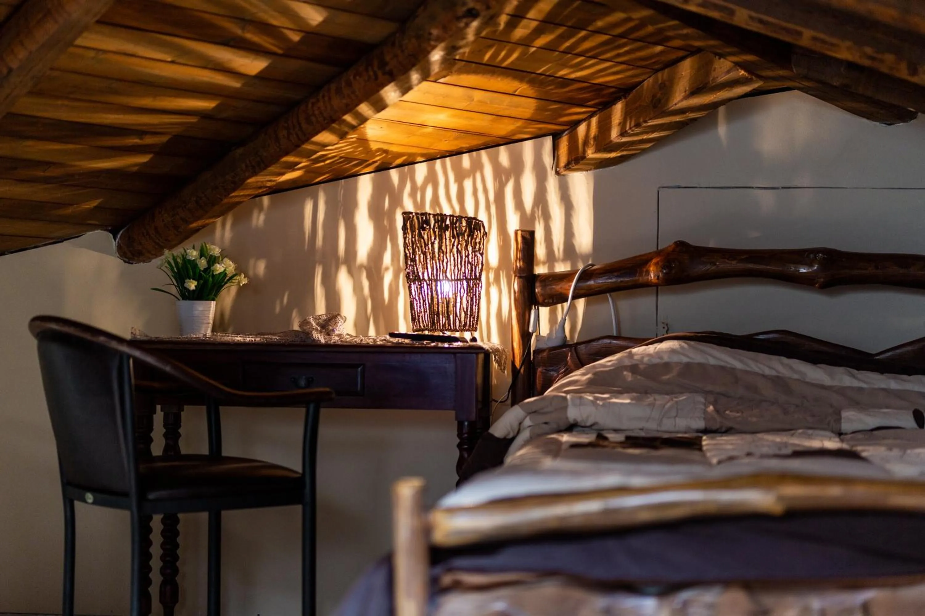 Bed in La Moara Boutique Hotel