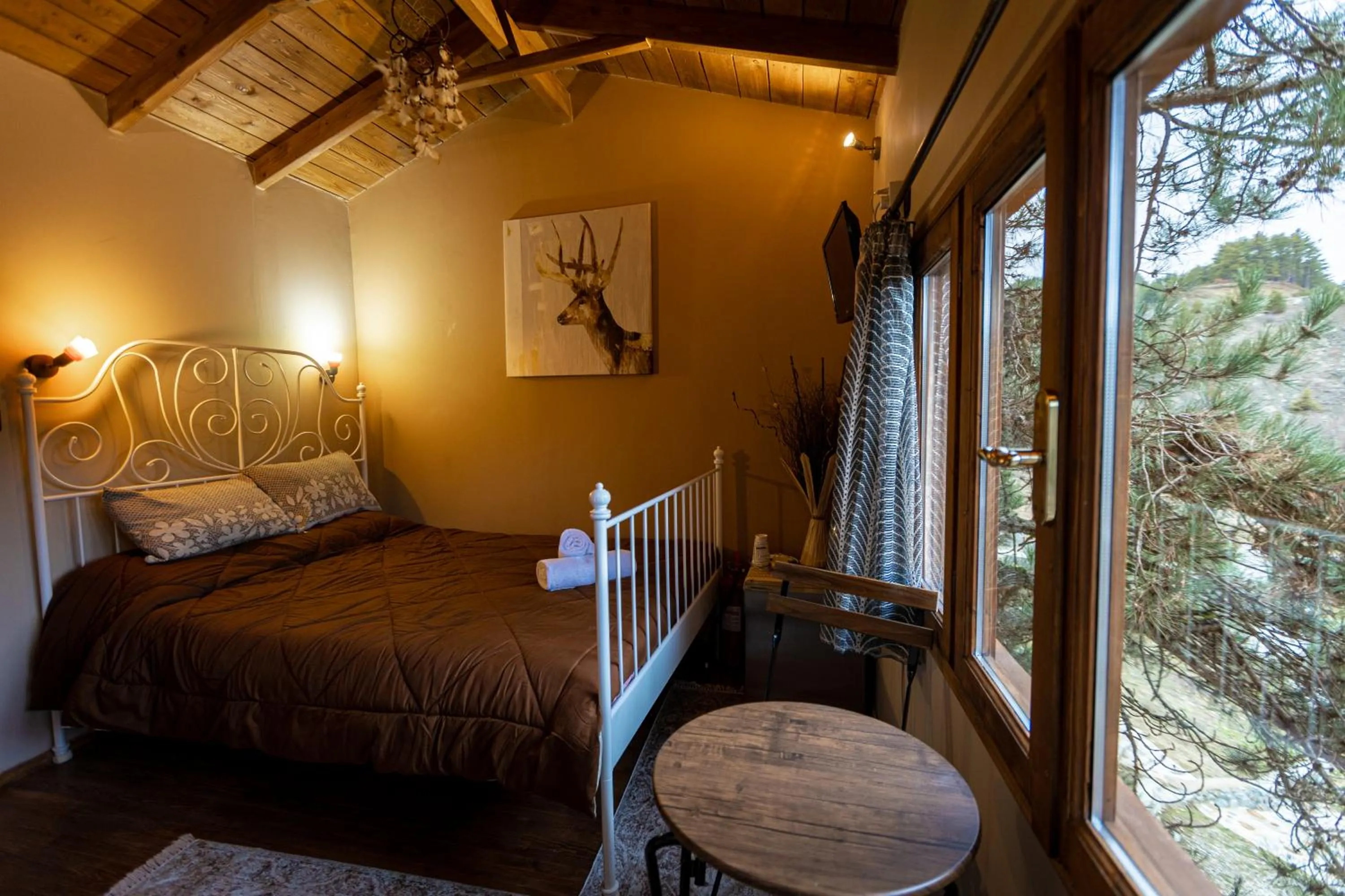 Bed in La Moara Boutique Hotel