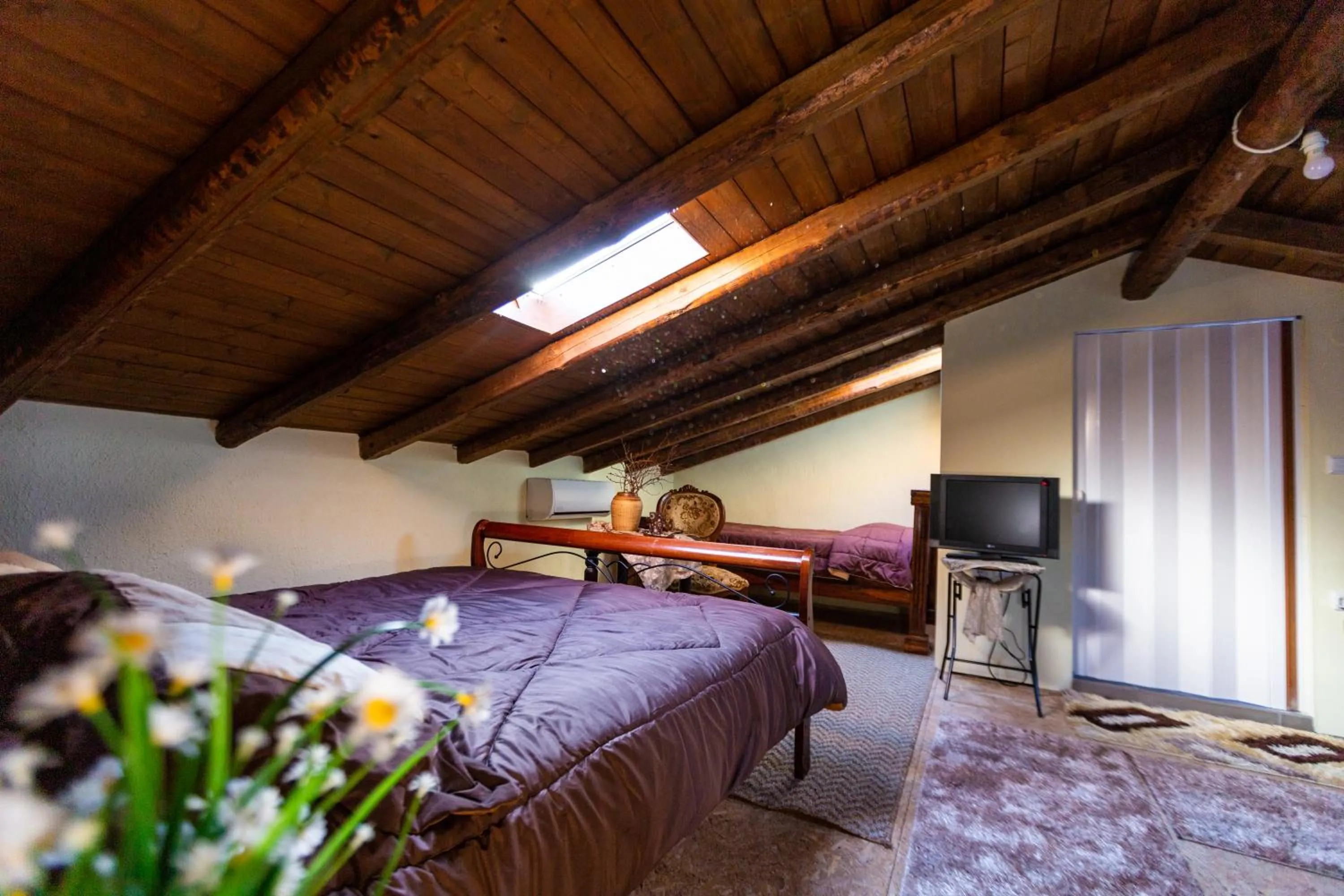 Bed in La Moara Boutique Hotel