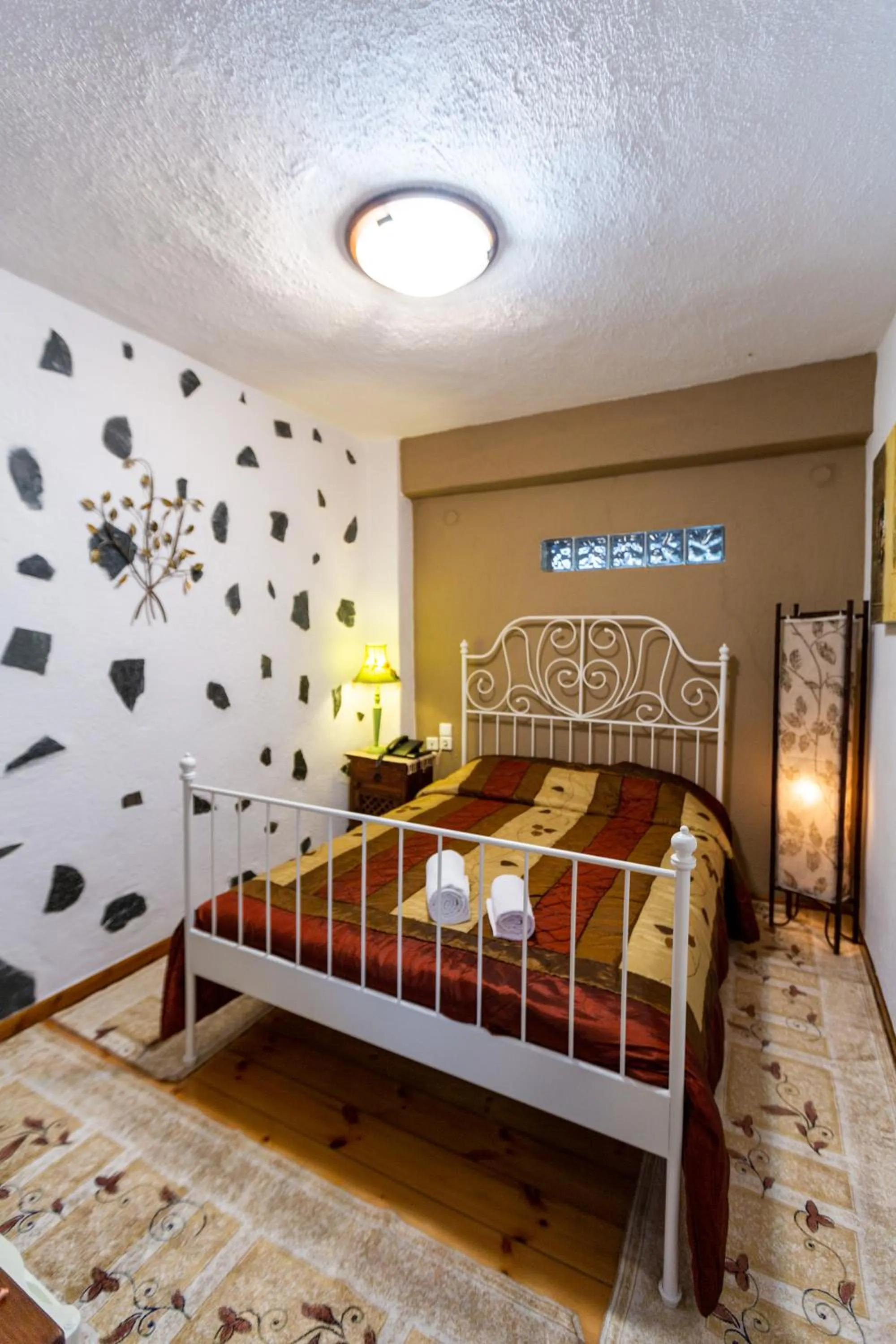 Bed in La Moara Boutique Hotel