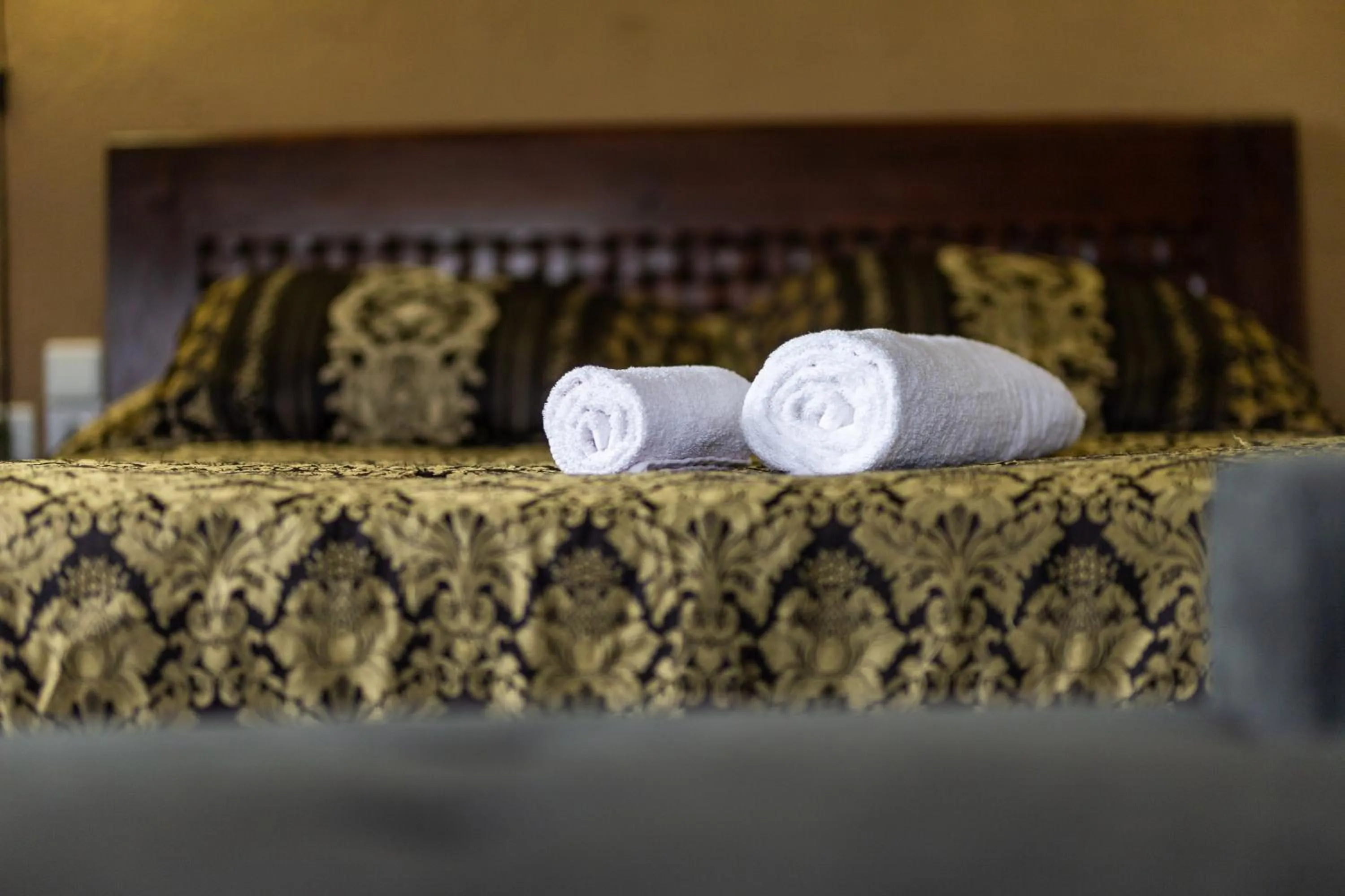 Bed in La Moara Boutique Hotel