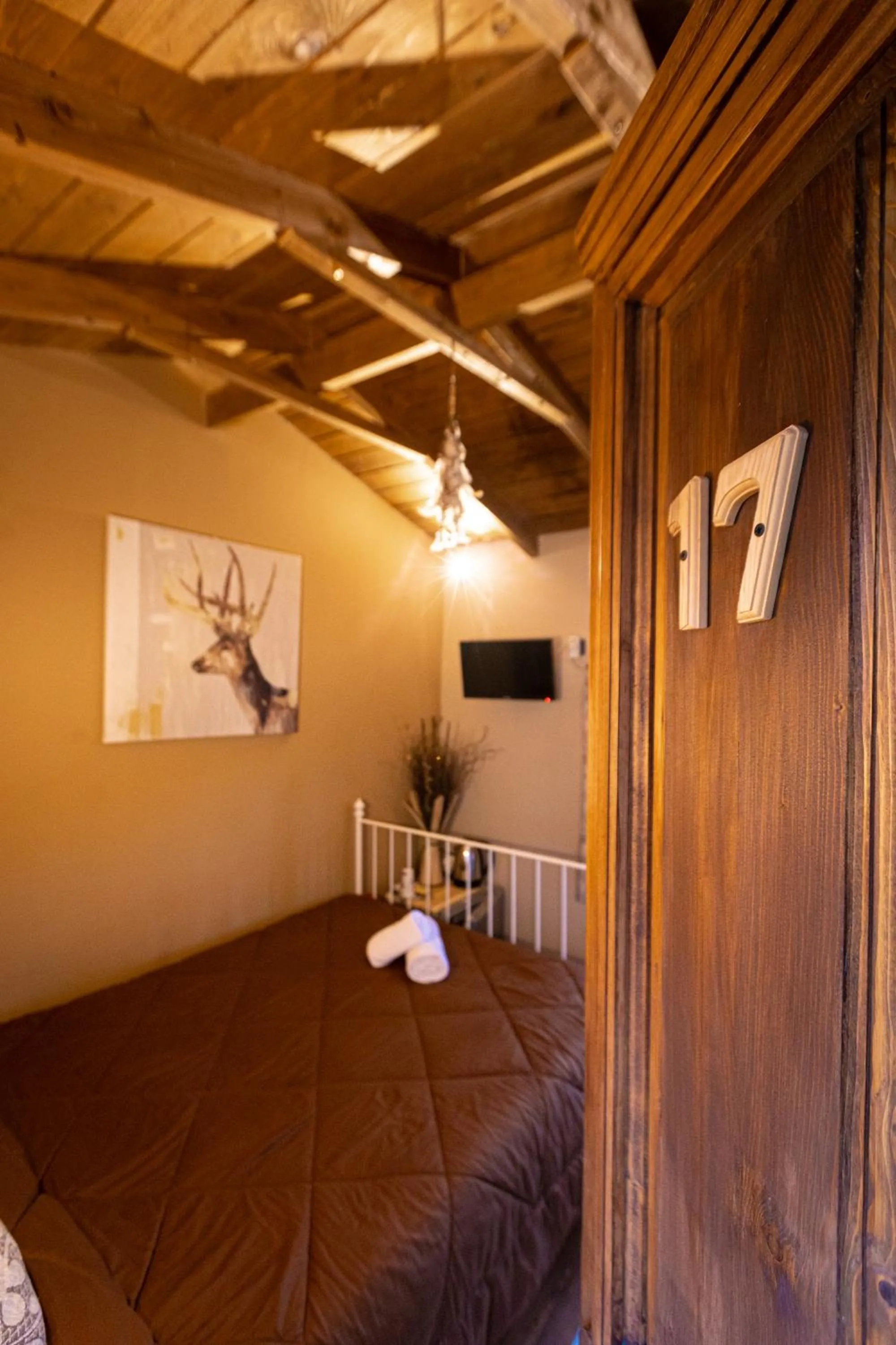 Bed in La Moara Boutique Hotel