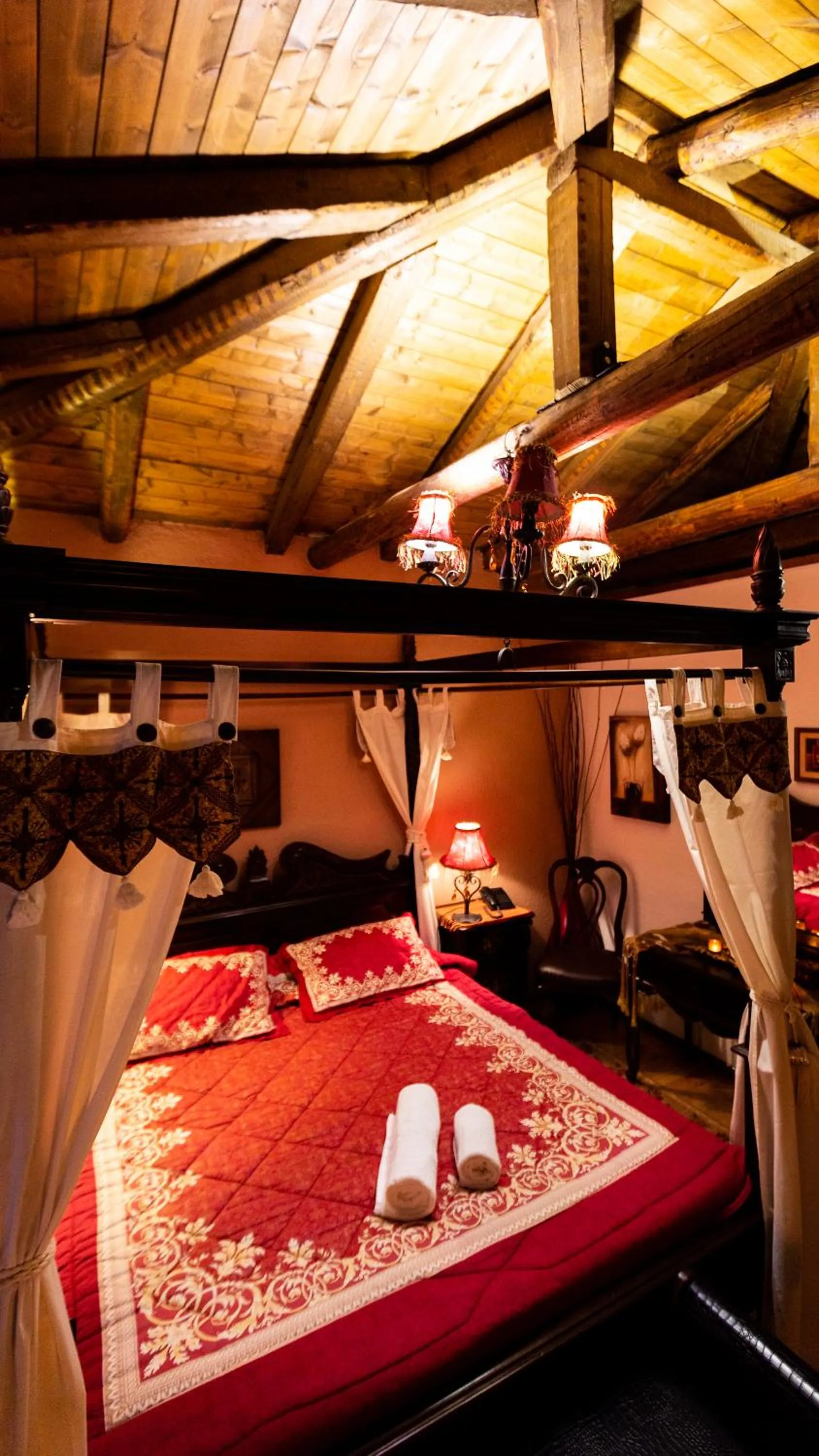 Bed in La Moara Boutique Hotel