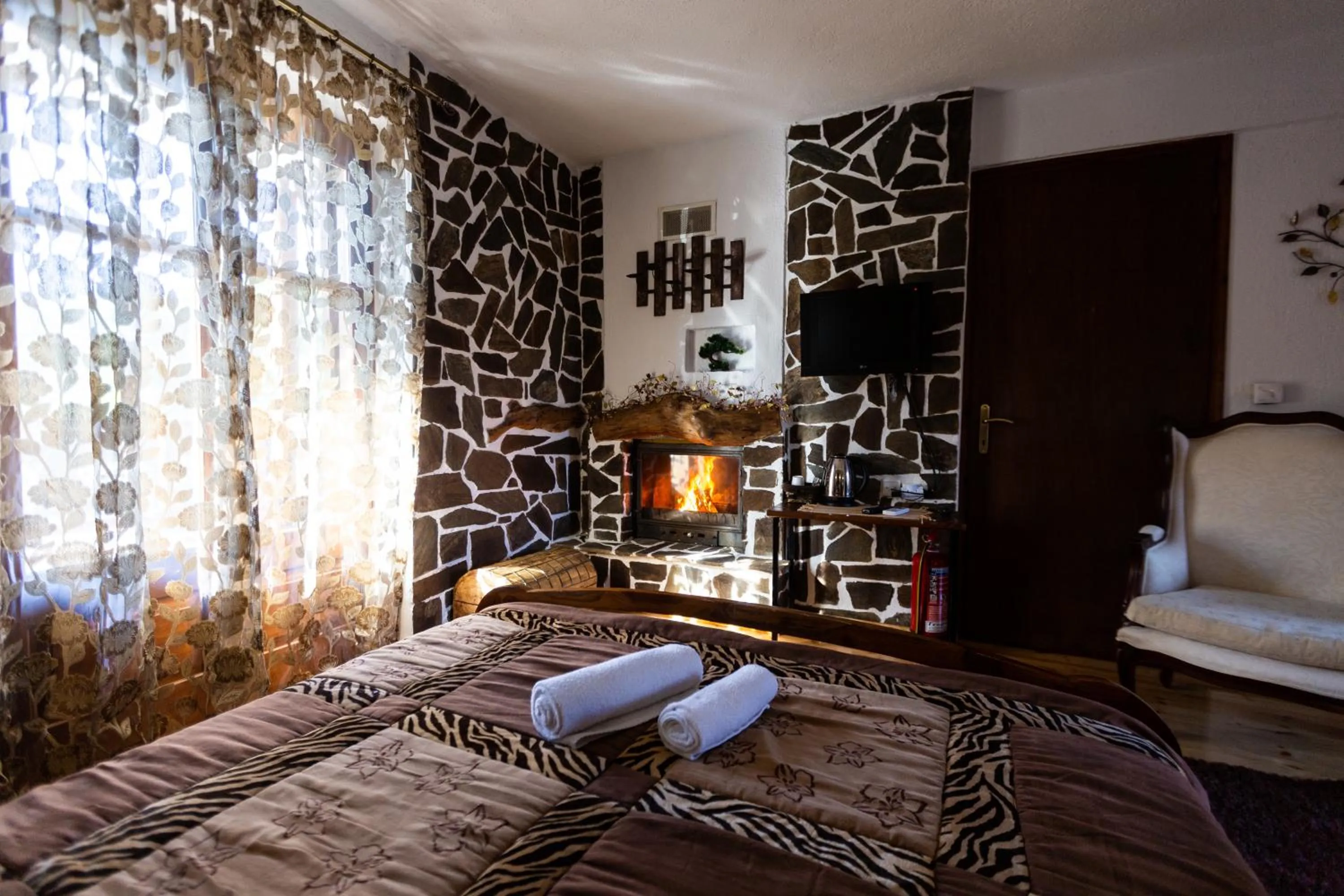 Bed in La Moara Boutique Hotel