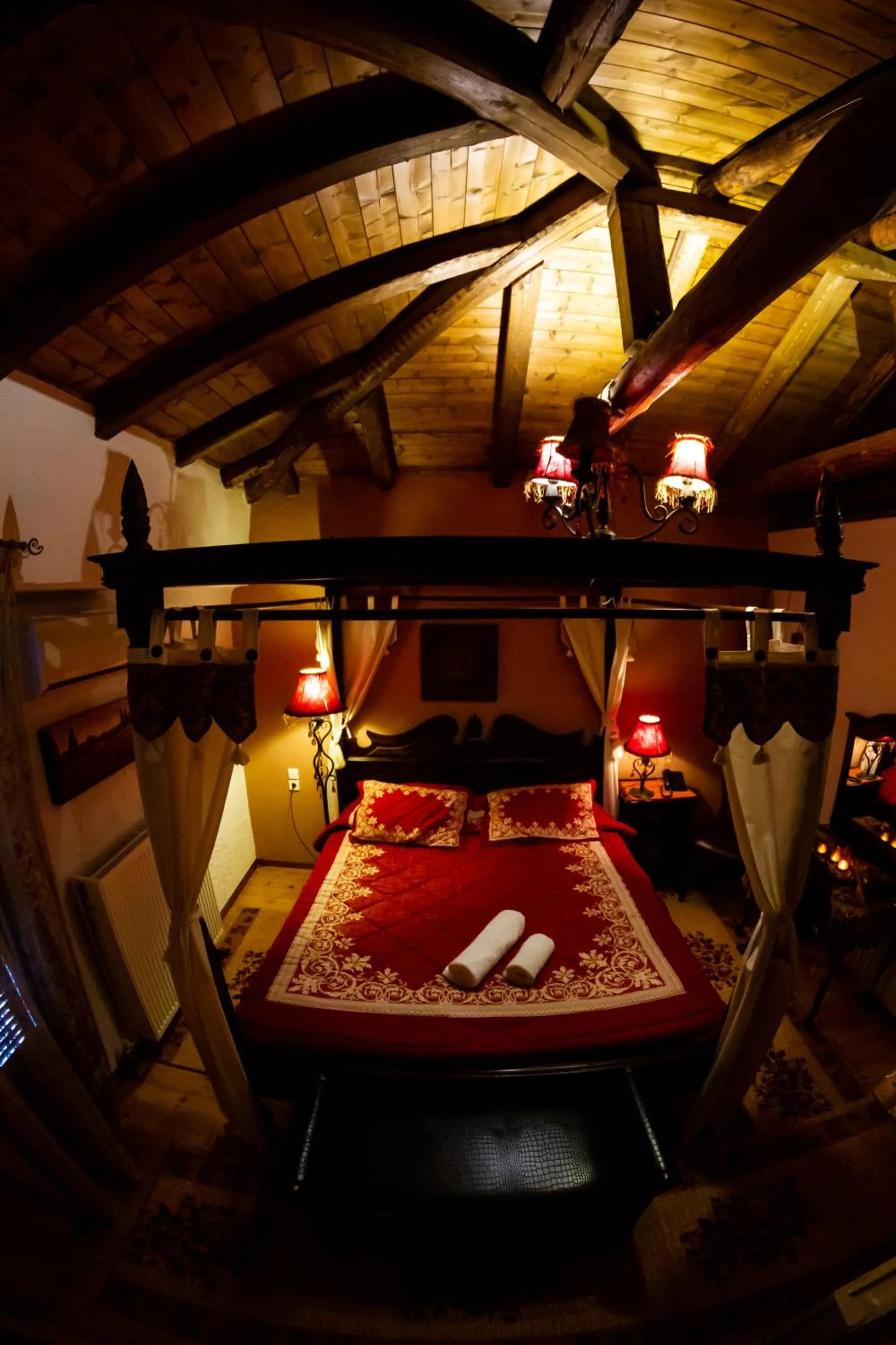 Bed in La Moara Boutique Hotel