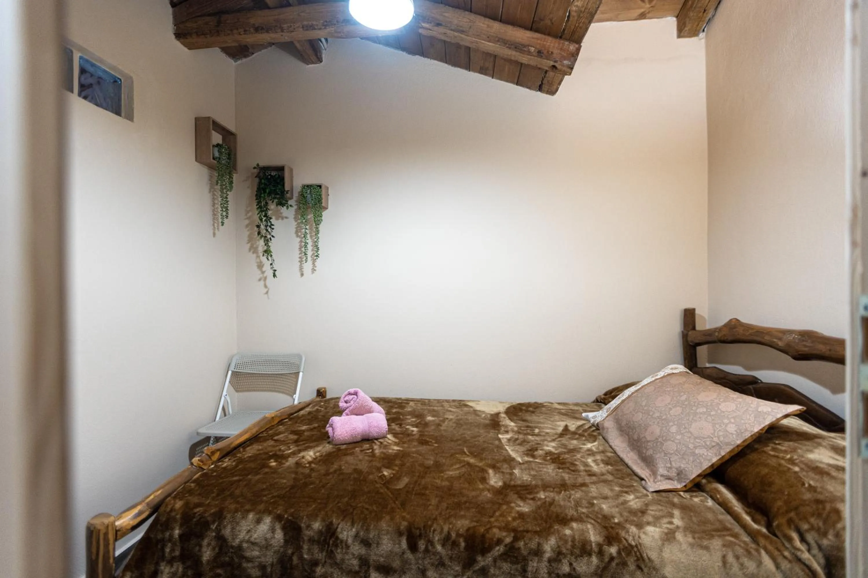 Bed in La Moara Boutique Hotel