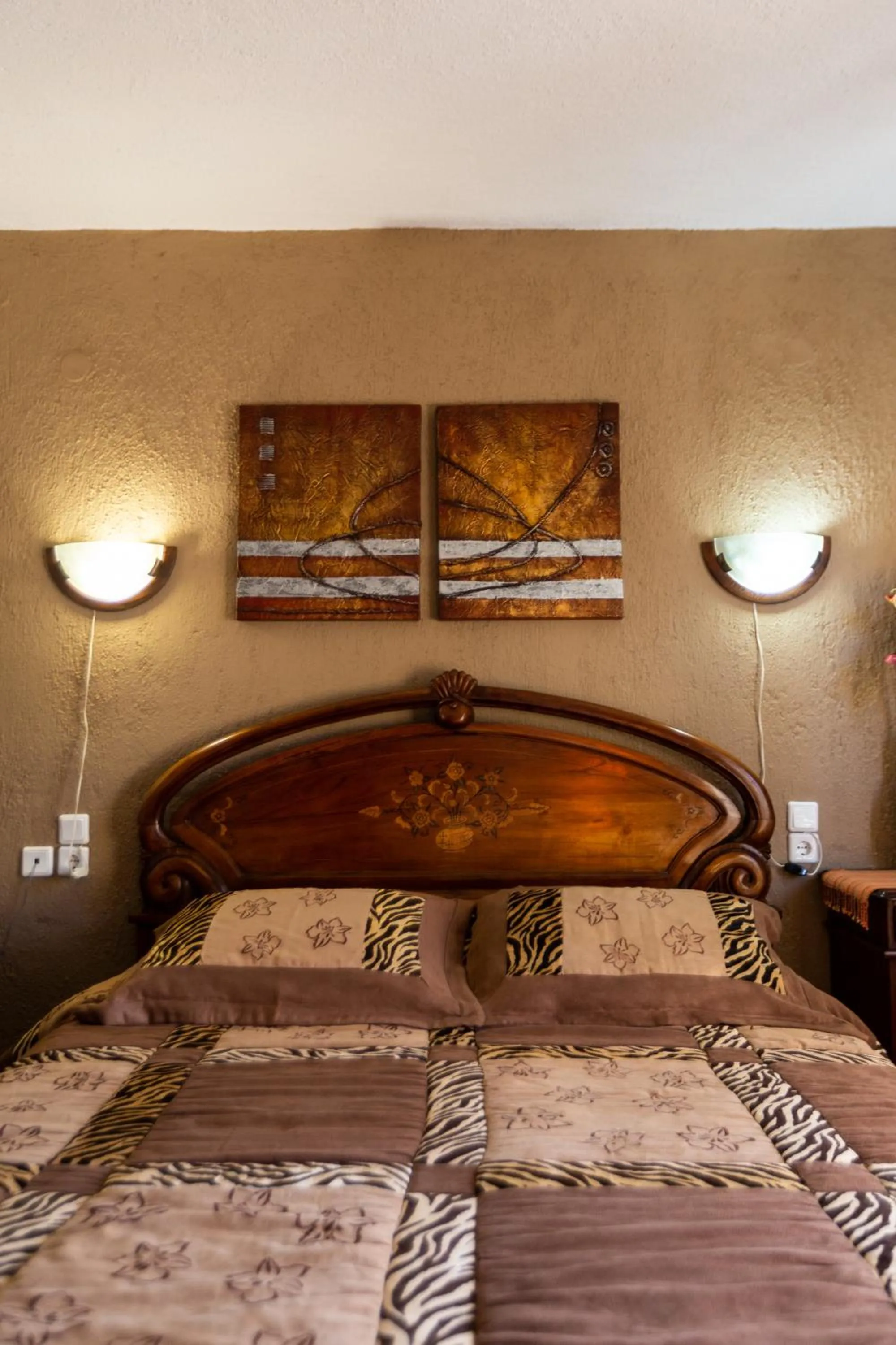 Bed in La Moara Boutique Hotel