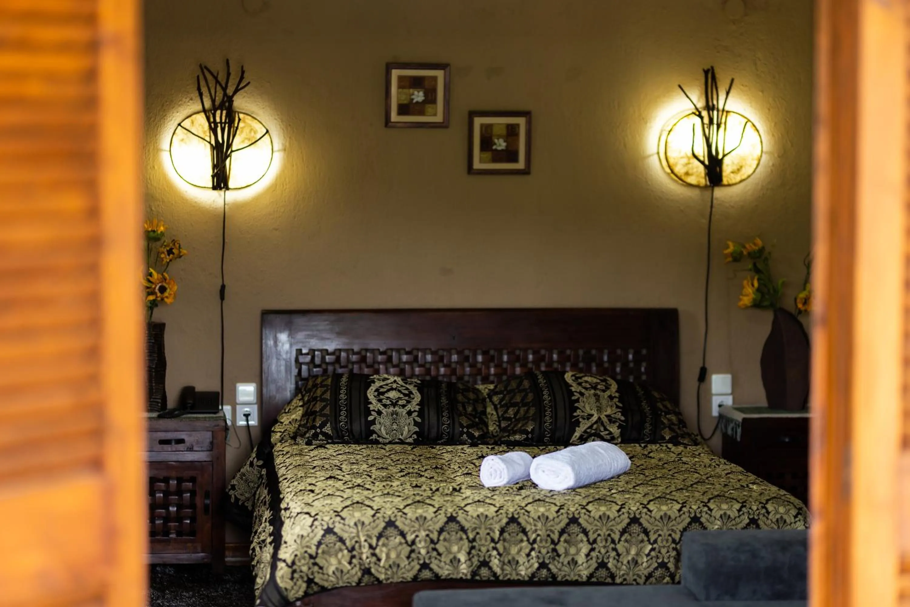 Bed in La Moara Boutique Hotel