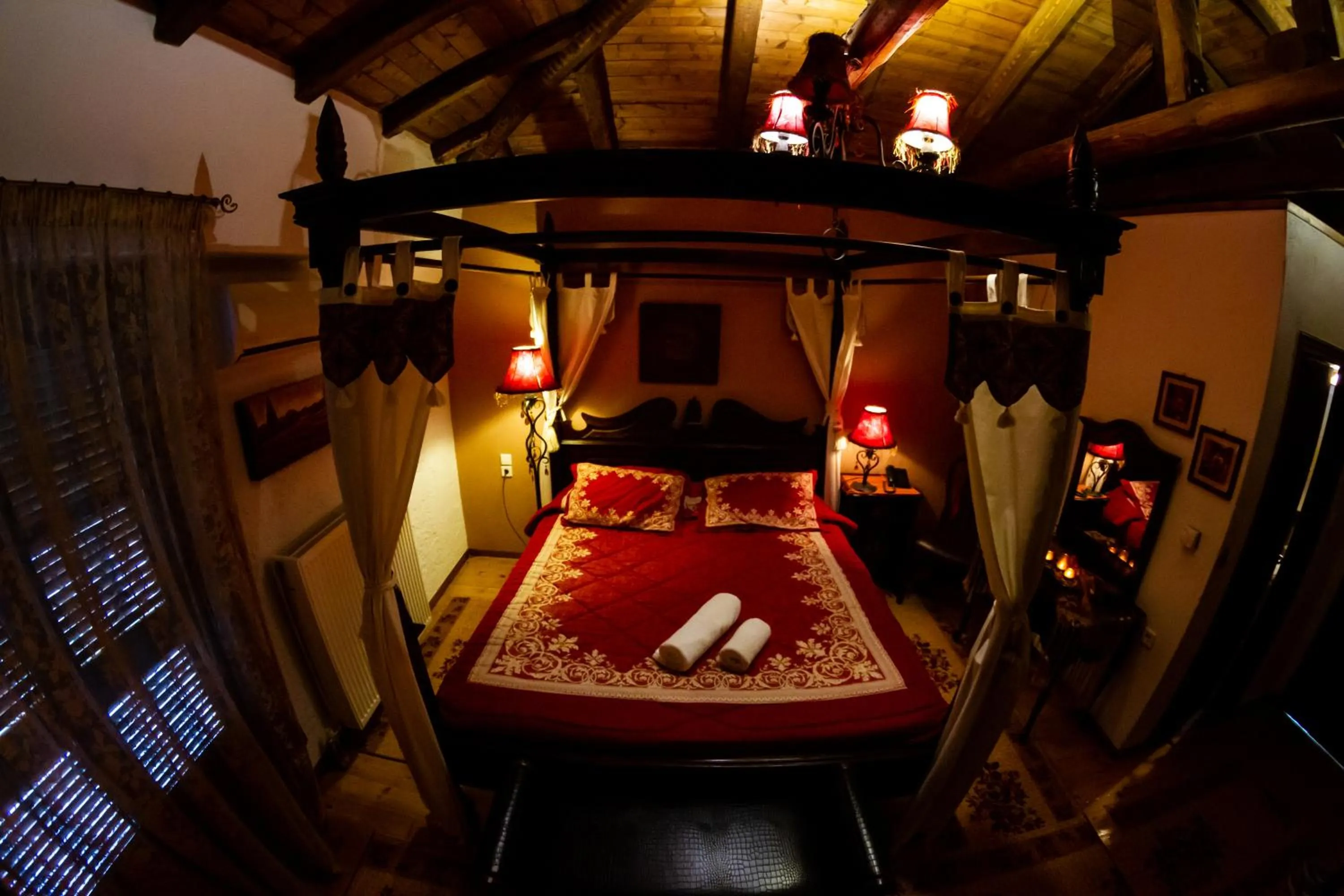 Bed in La Moara Boutique Hotel