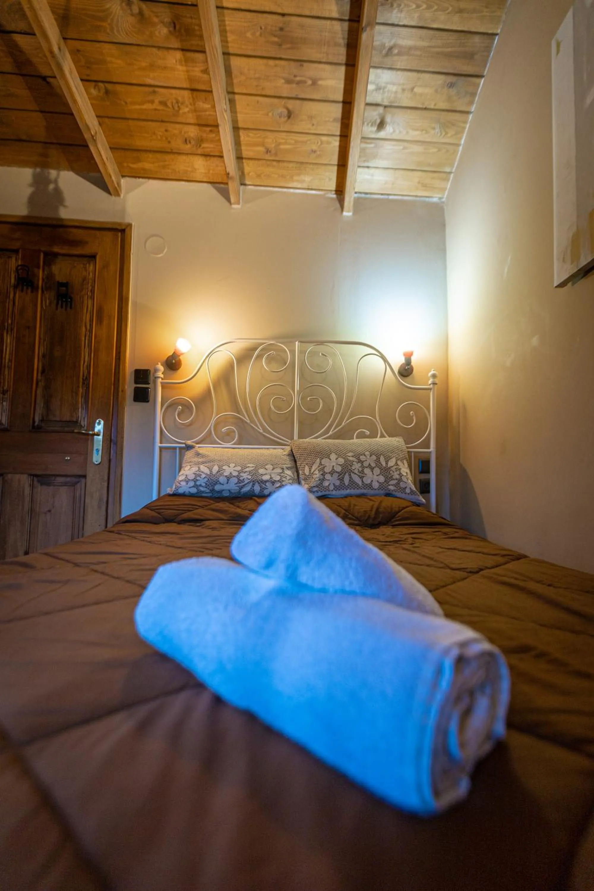 Bed in La Moara Boutique Hotel