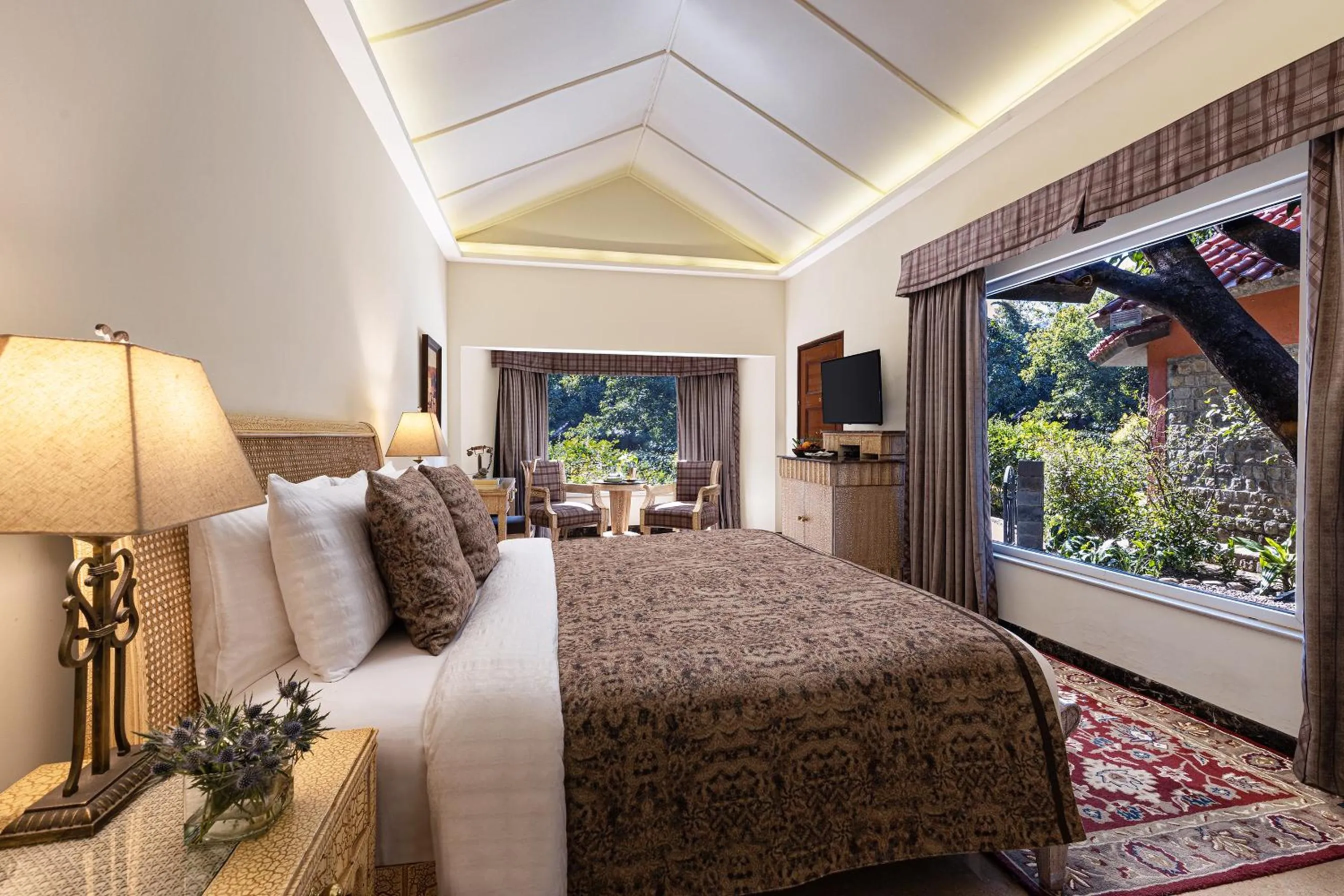 Bed in Taj Corbett Resort and Spa Uttarakhand