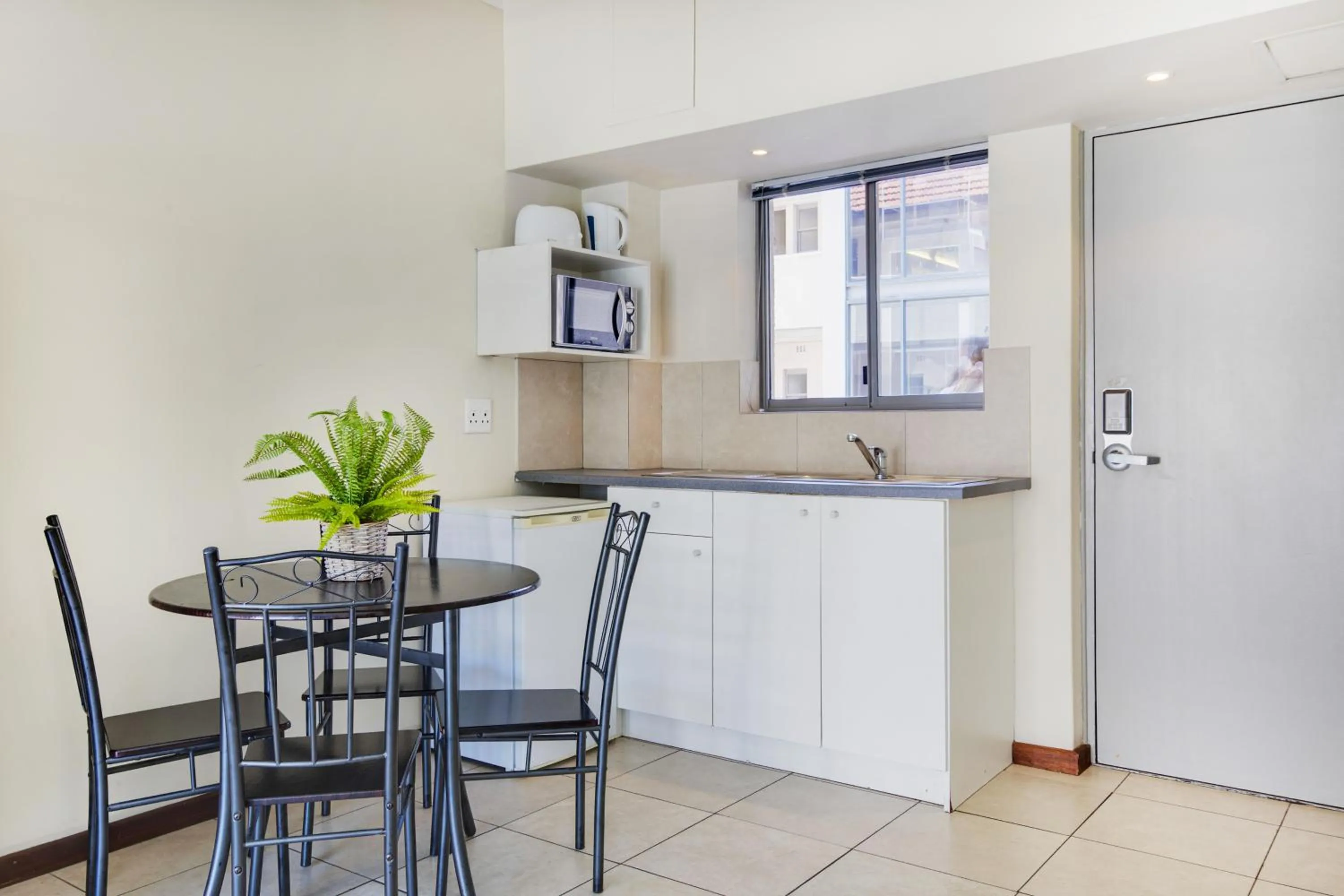 Kitchen or kitchenette in The Amalfi Boutique Hotel