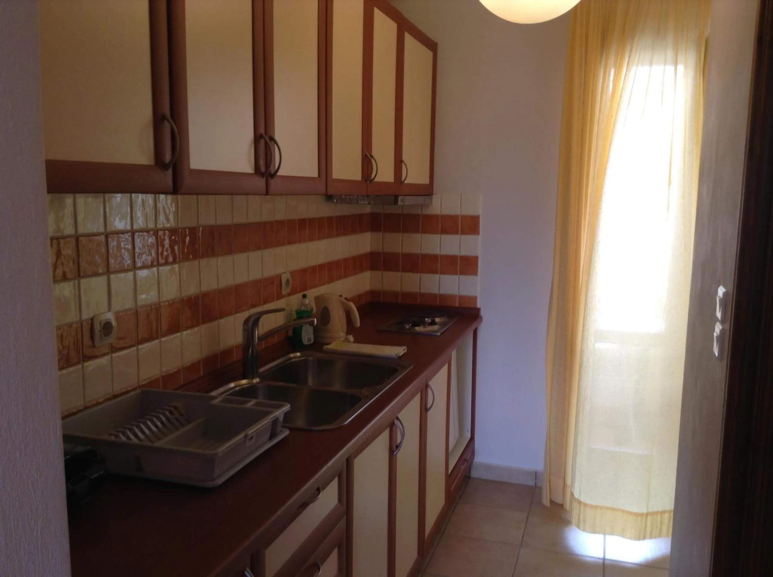Kitchen or kitchenette in Antonia Apartments