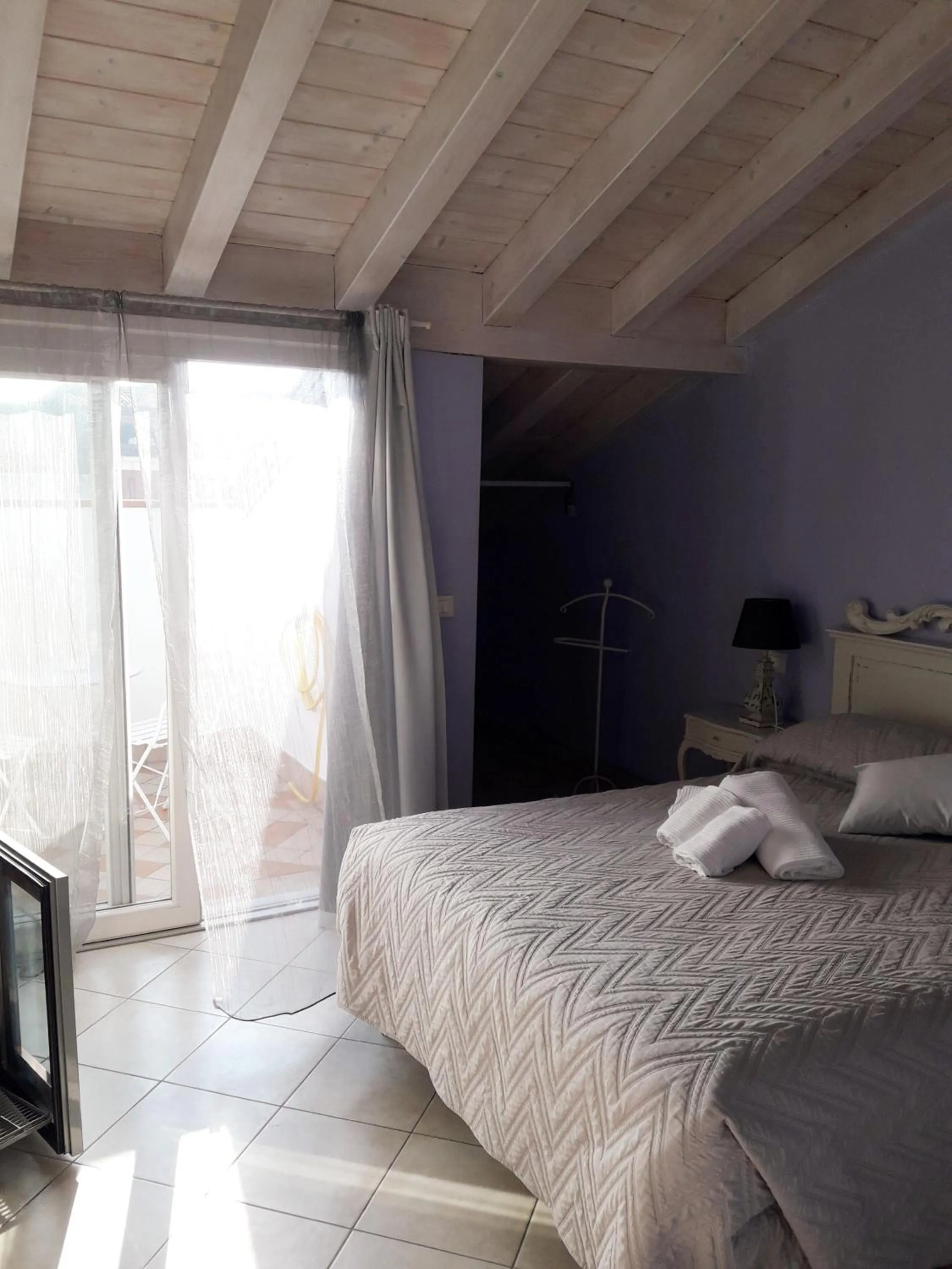 Bedroom, Bed in Le Rêve - Lake view rooms