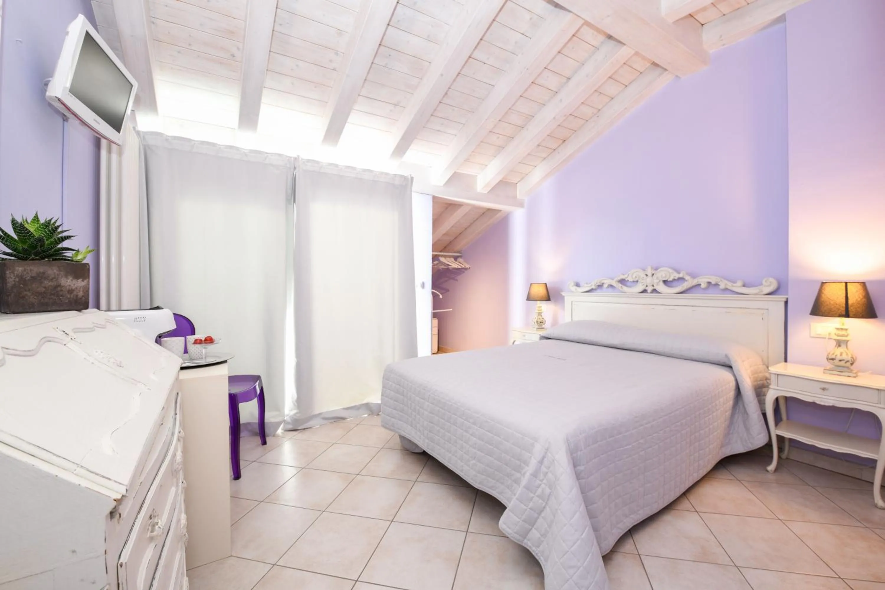 Bed in Le Rêve - Lake view rooms