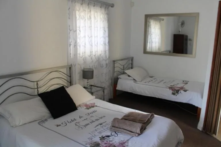 Bed in Lazy Gecko Accommodation