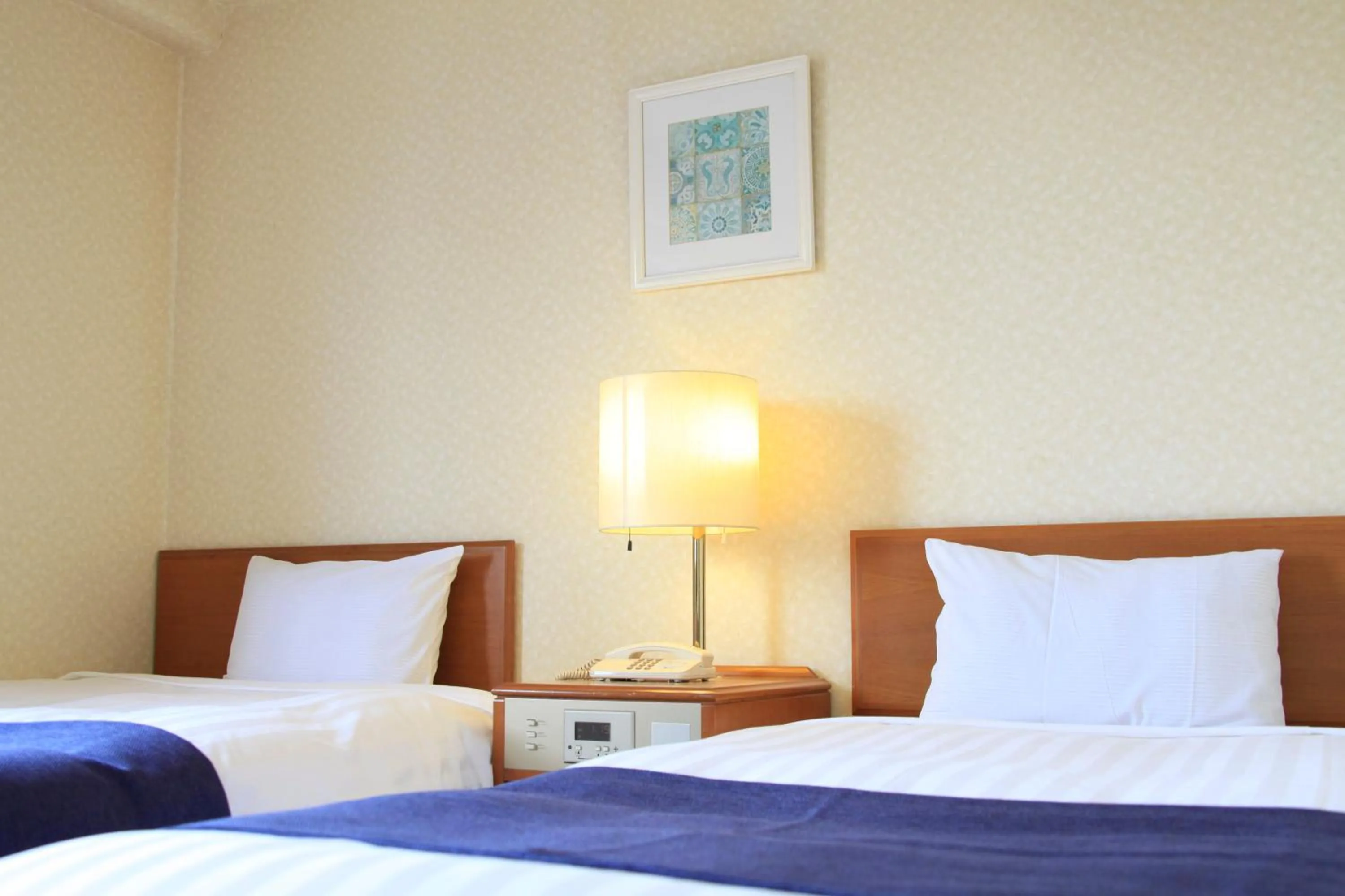 Bed in Shonandai Daiichi Hotel Fujisawa Yokohama