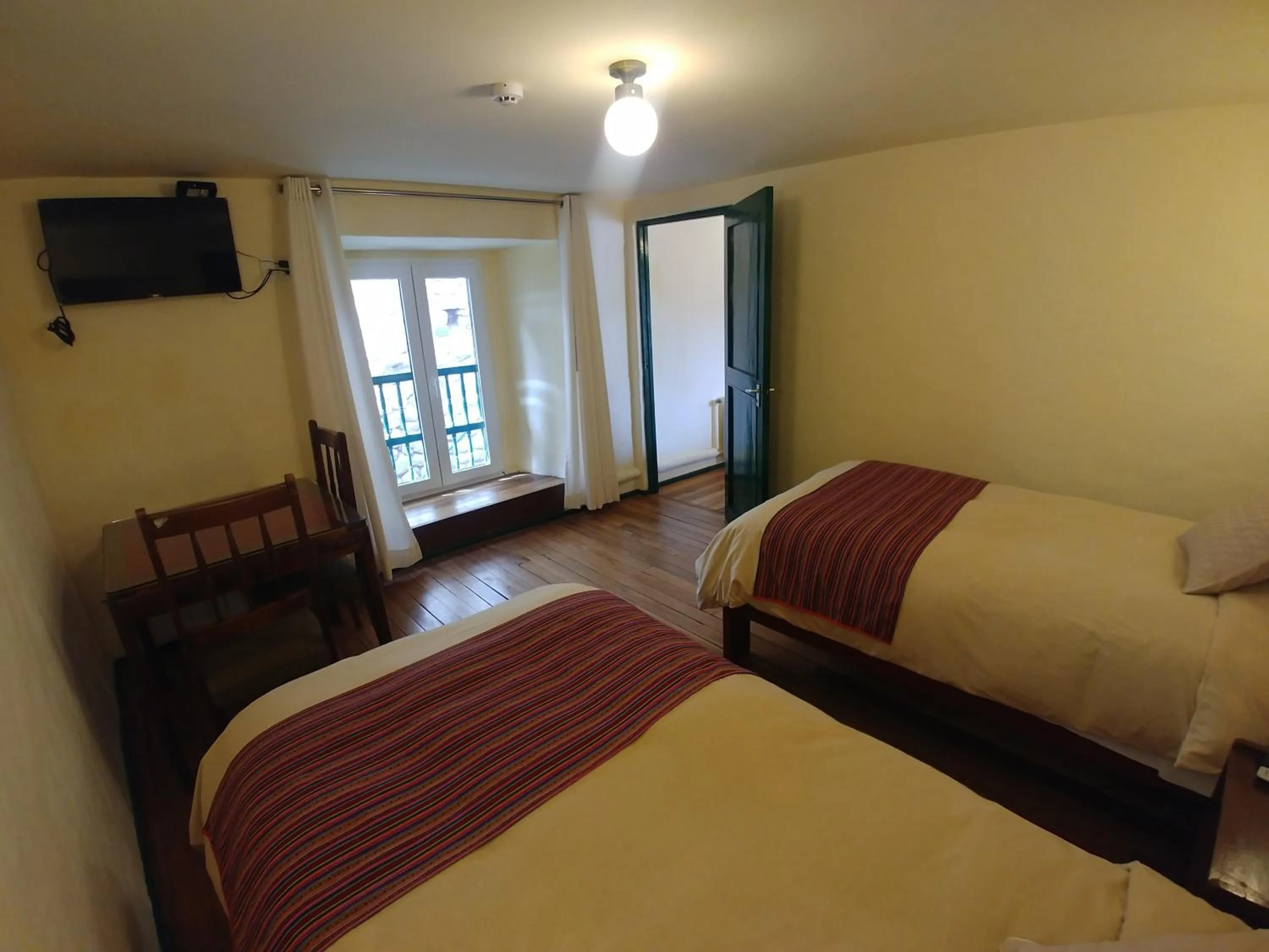 Photo of the whole room, Bed in Hostal Corihuasi