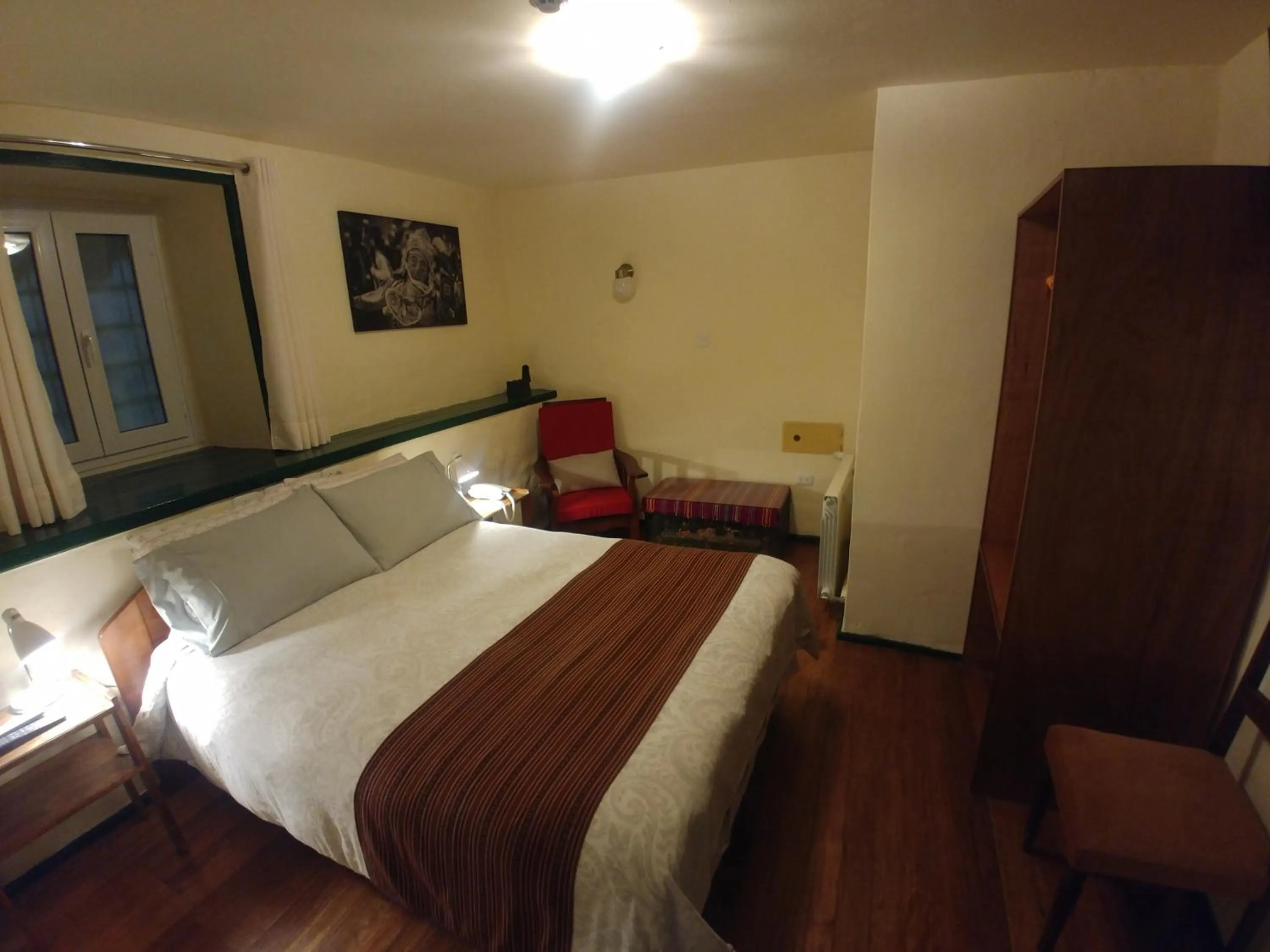 Bed in Hostal Corihuasi