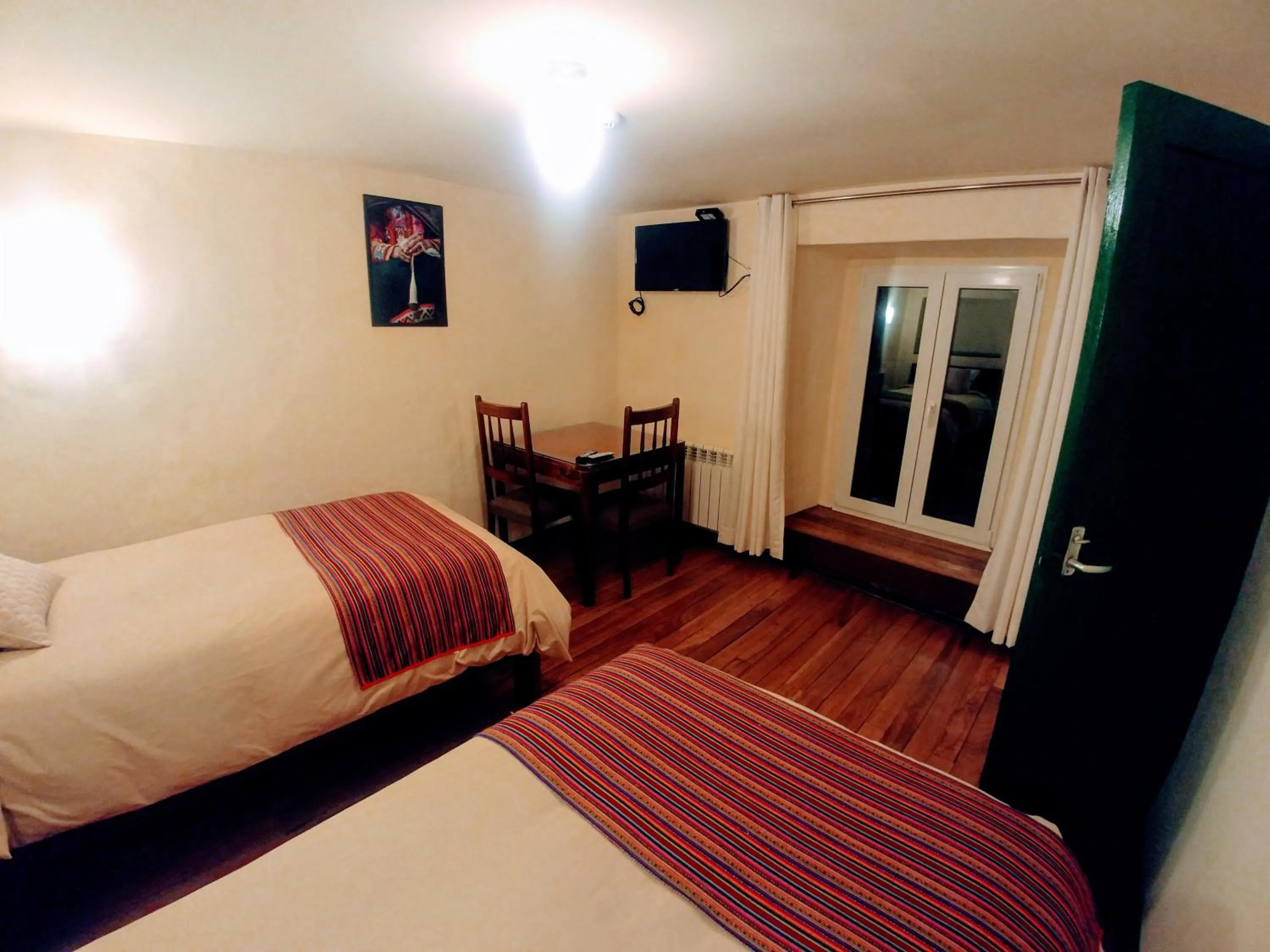 TV and multimedia, Bed in Hostal Corihuasi