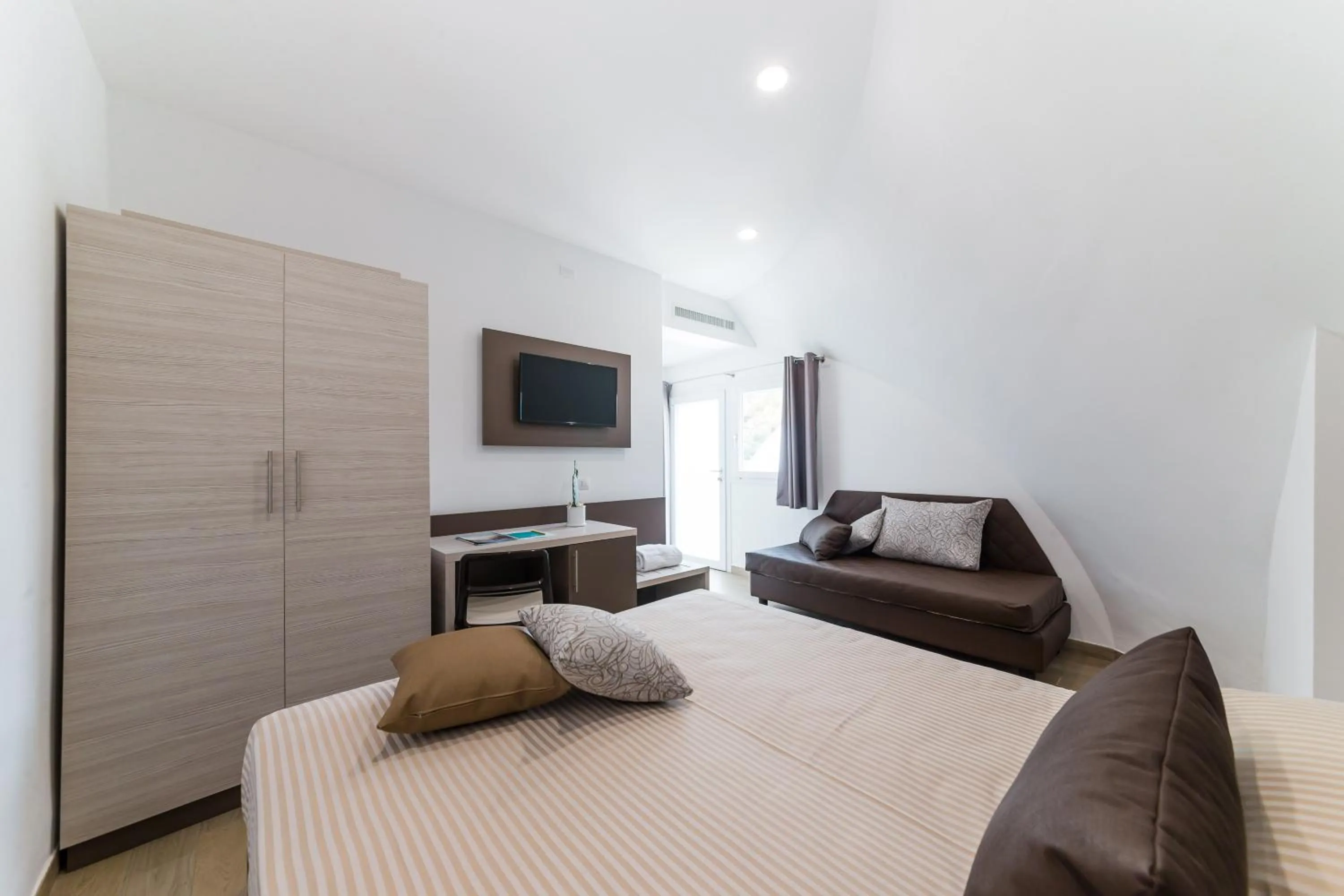 Photo of the whole room, Bed in Torre Cintola Greenblu Sea Emotions