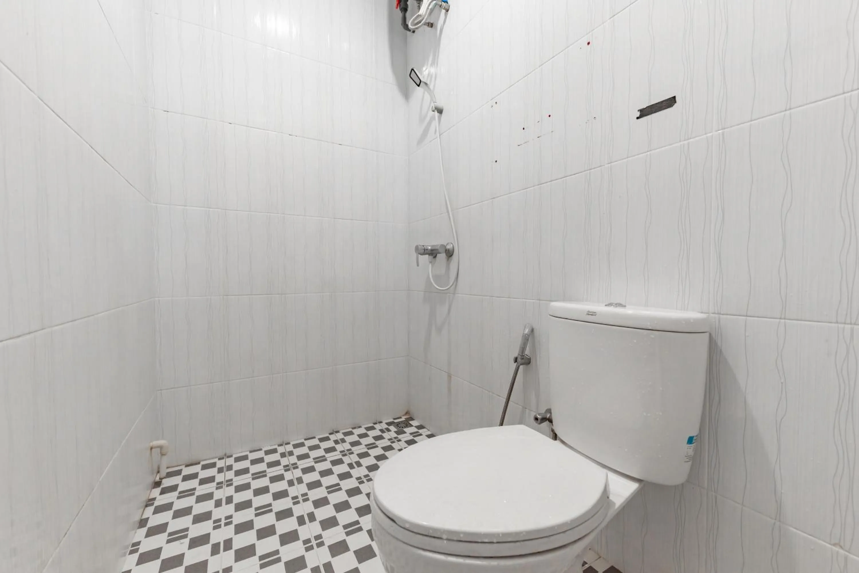 Bedroom in RedDoorz Plus near Kepri Mall