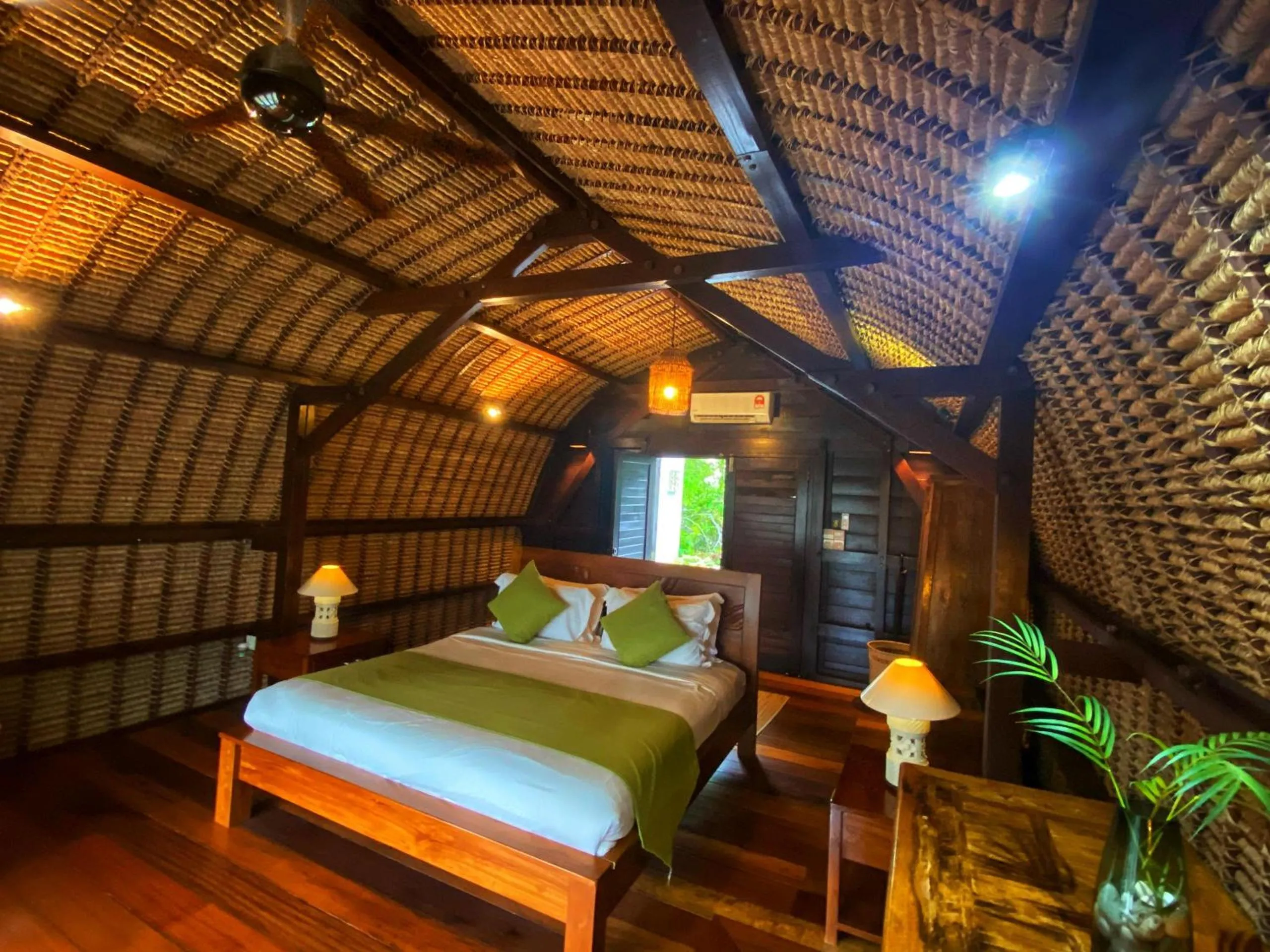 Bed in Kudat Riviera Exclusive Beach Villas