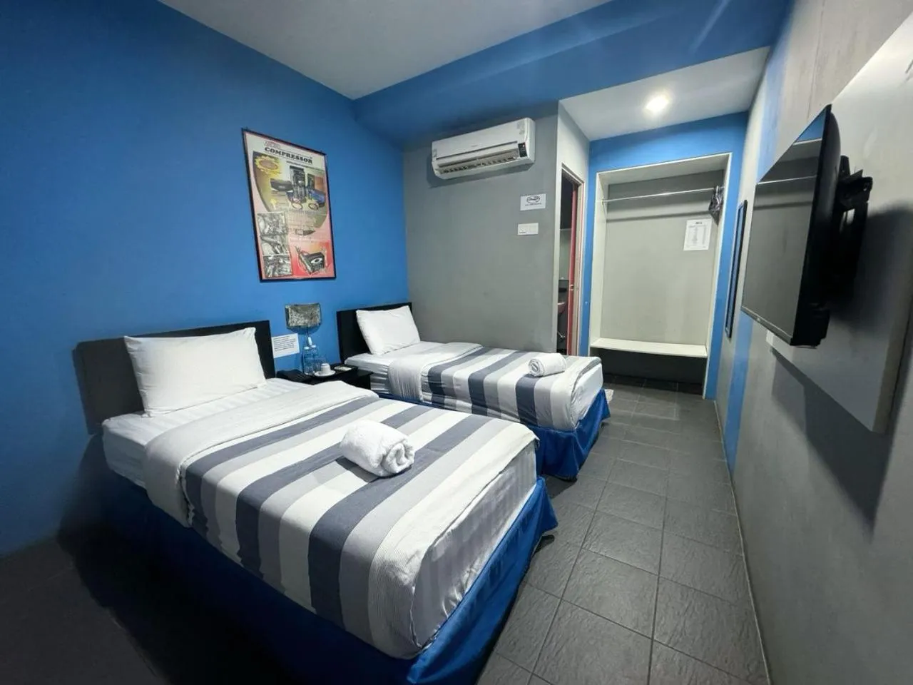 Bed in Metroinn Hotel