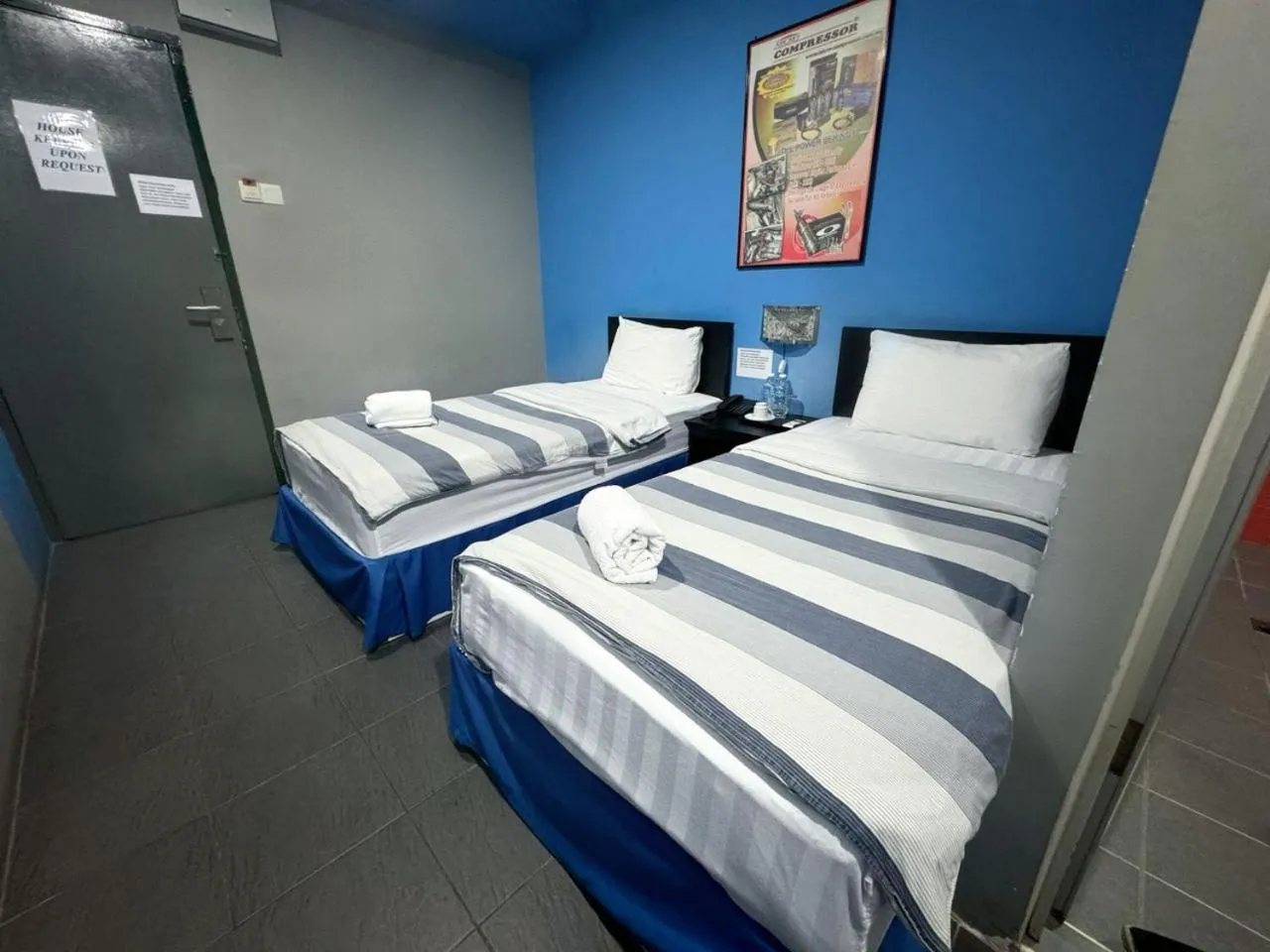 Bed in Metroinn Hotel