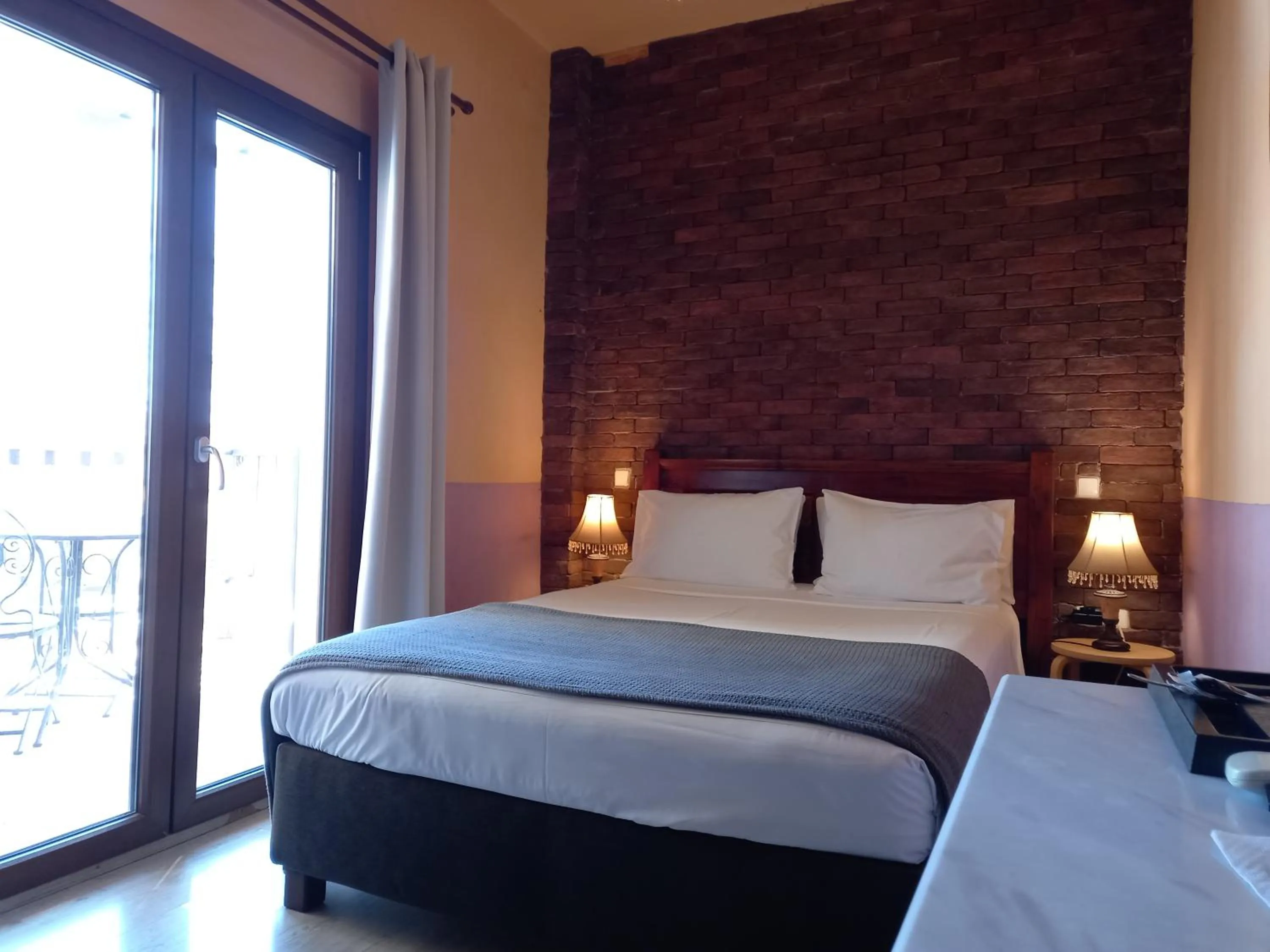 Bed in Mythos Guesthouse