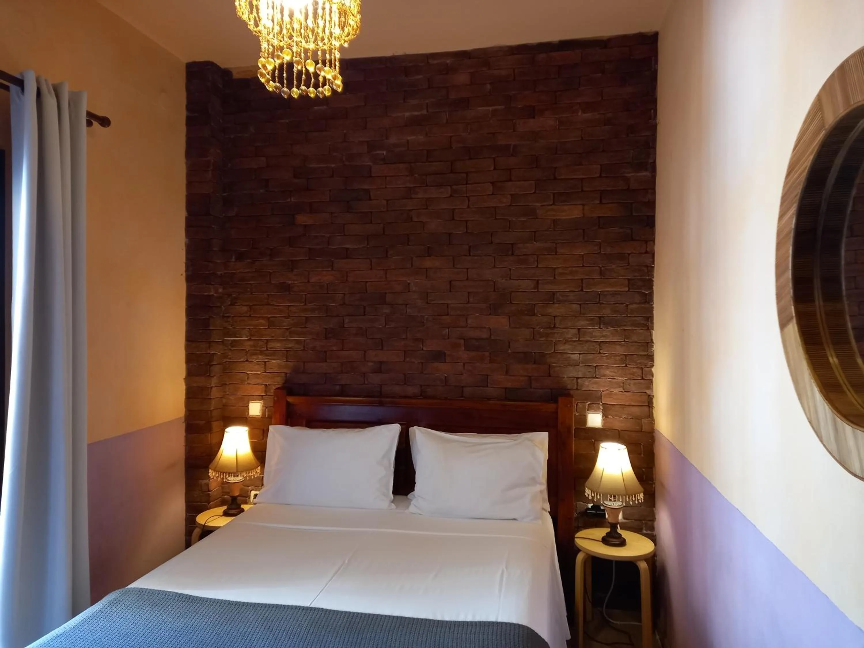 Bed in Mythos Guesthouse