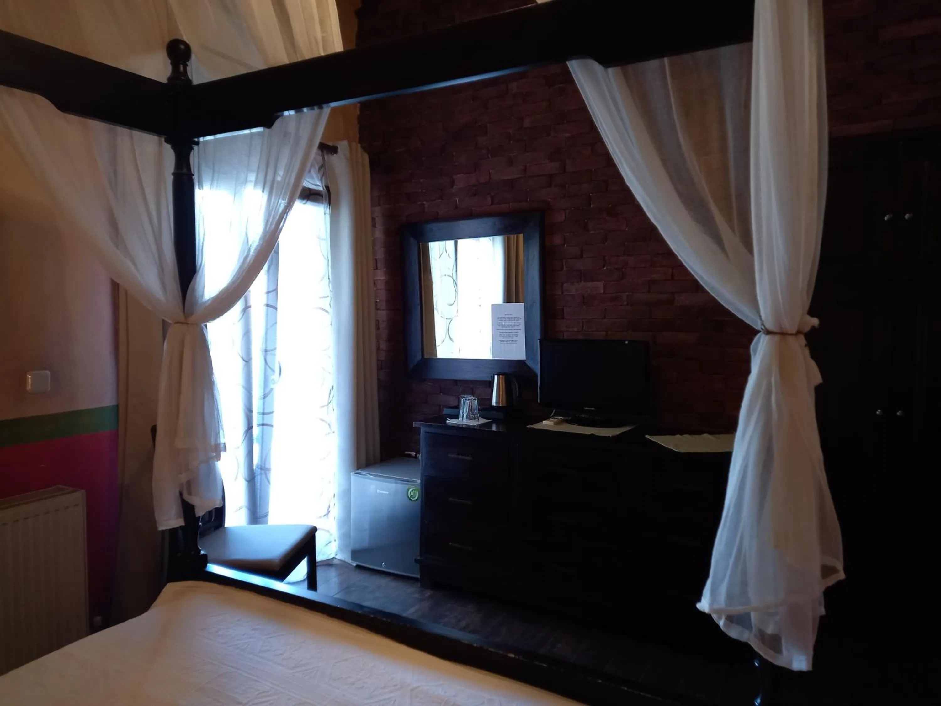 Bed in Mythos Guesthouse