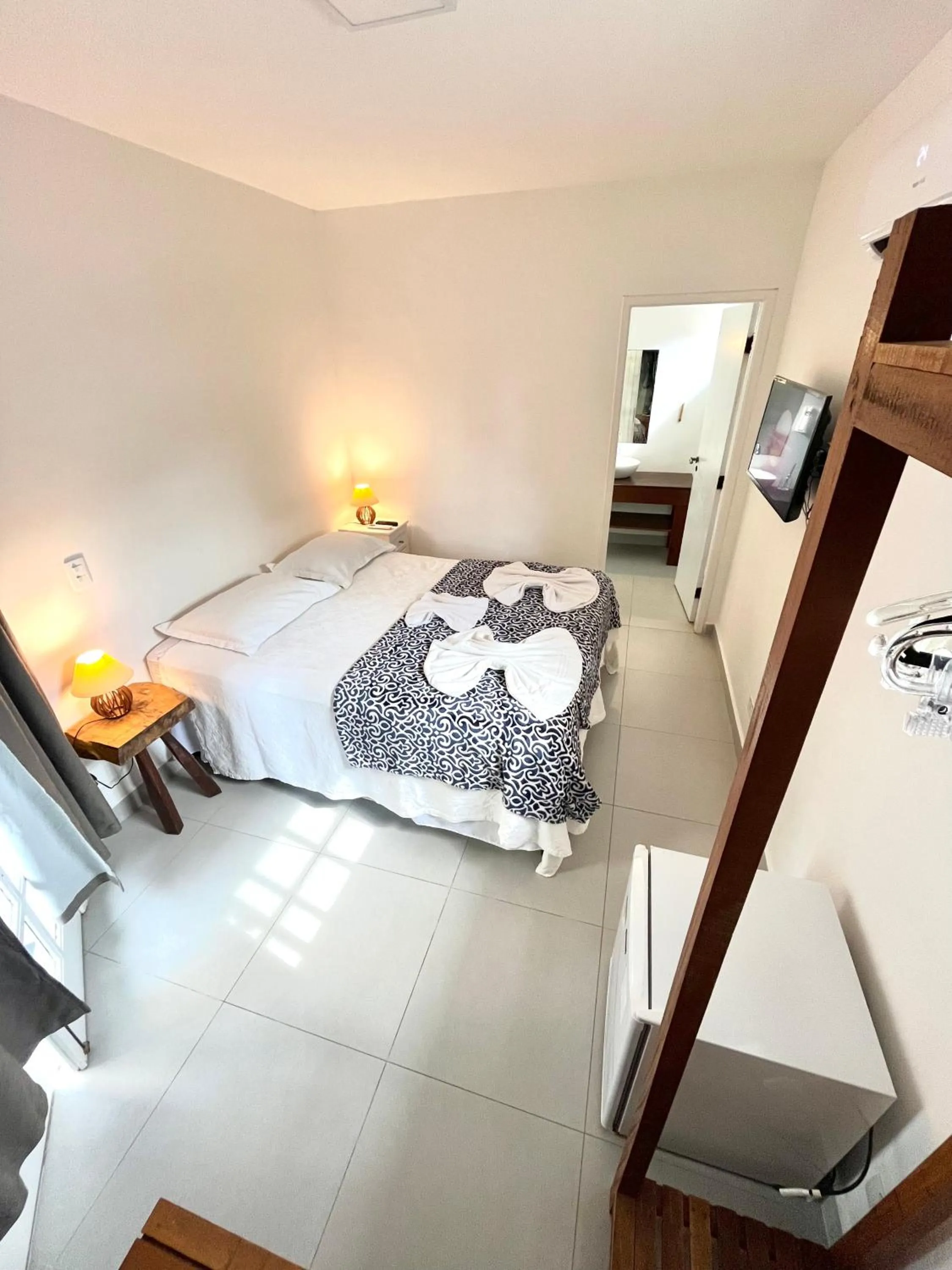 Bed in Pousada Tô na Praia Juquehy