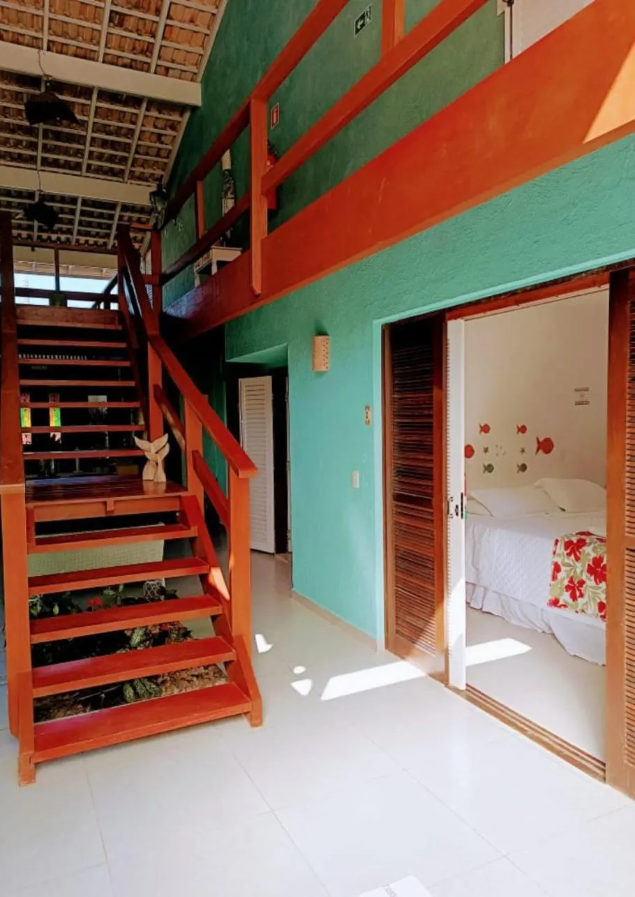 Bed in Pousada Tô na Praia Juquehy