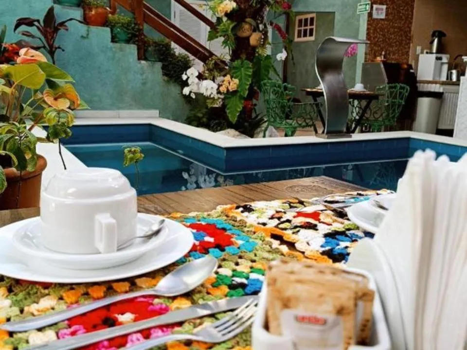 Pool view in Pousada Tô na Praia Juquehy