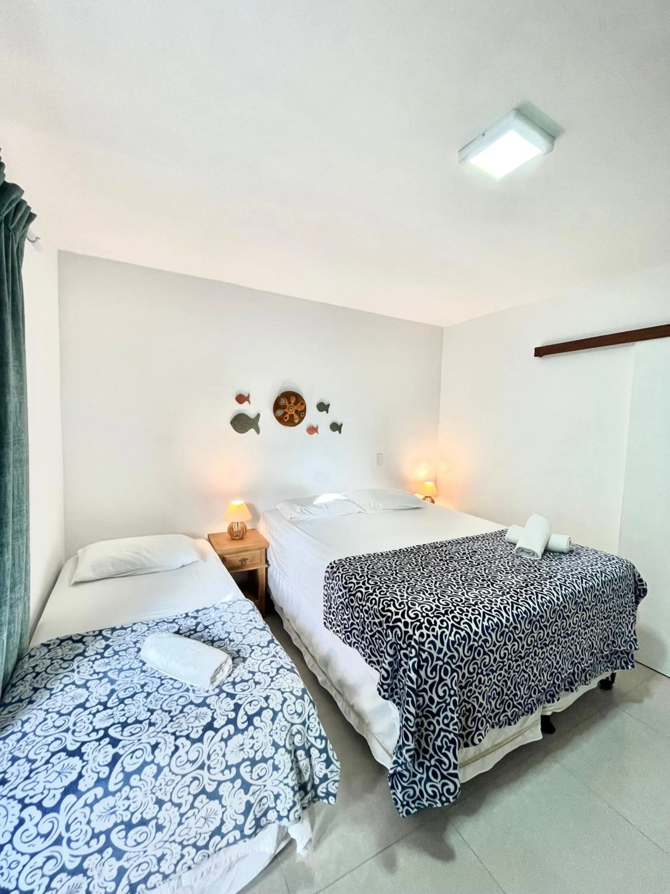 Bed in Pousada Tô na Praia Juquehy