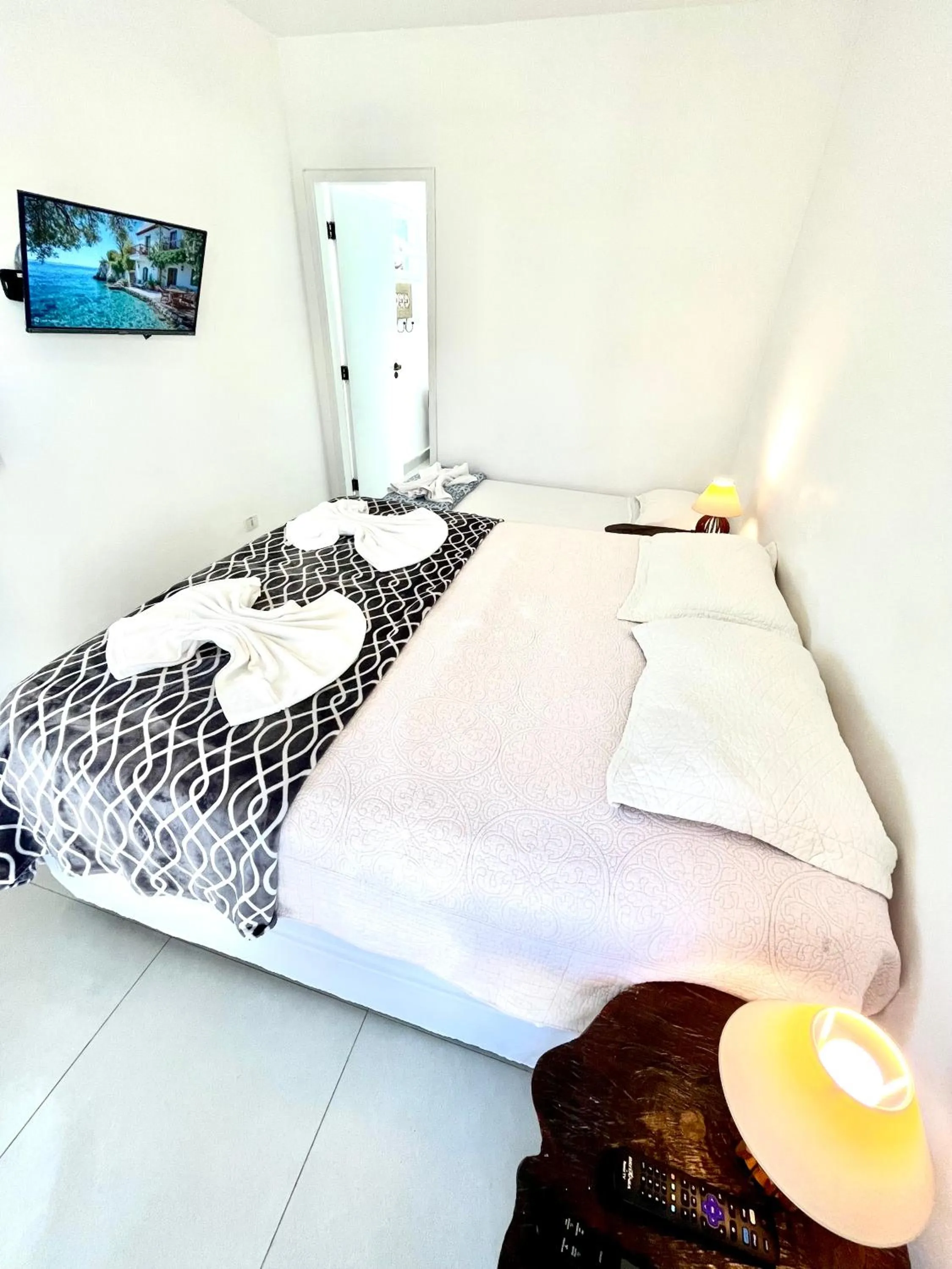 Bed in Pousada Tô na Praia Juquehy