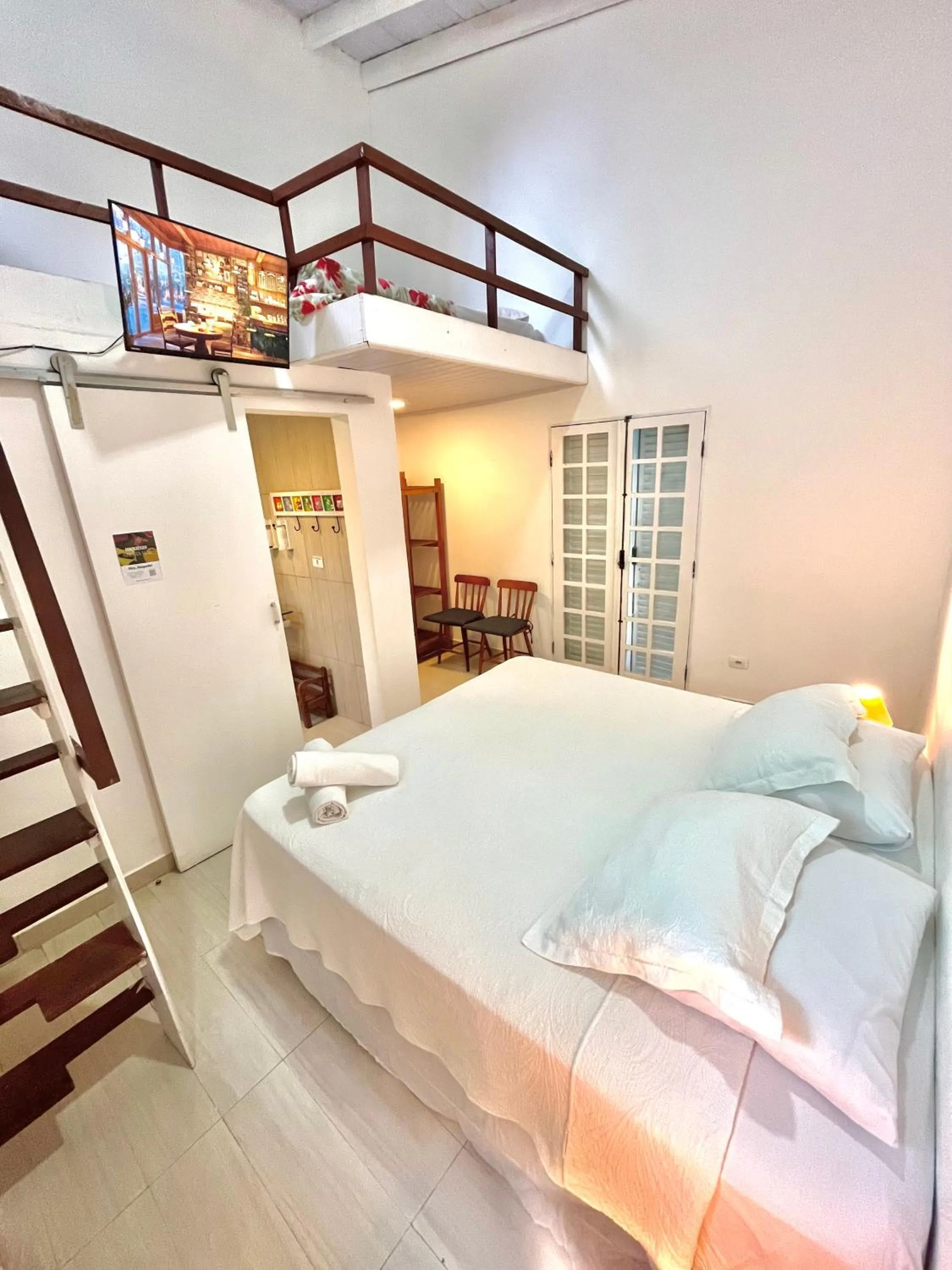 Bed in Pousada Tô na Praia Juquehy