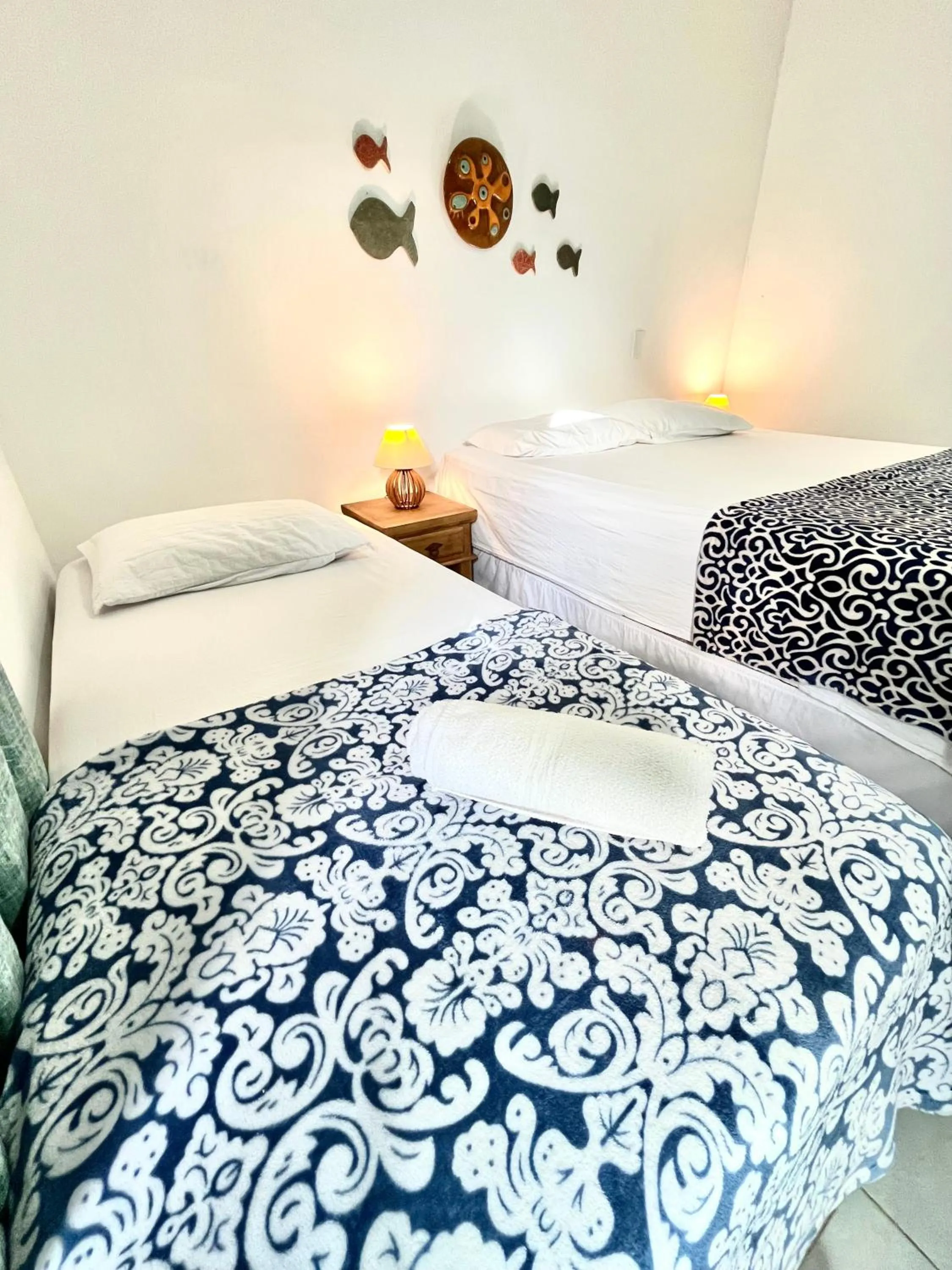 Bed in Pousada Tô na Praia Juquehy