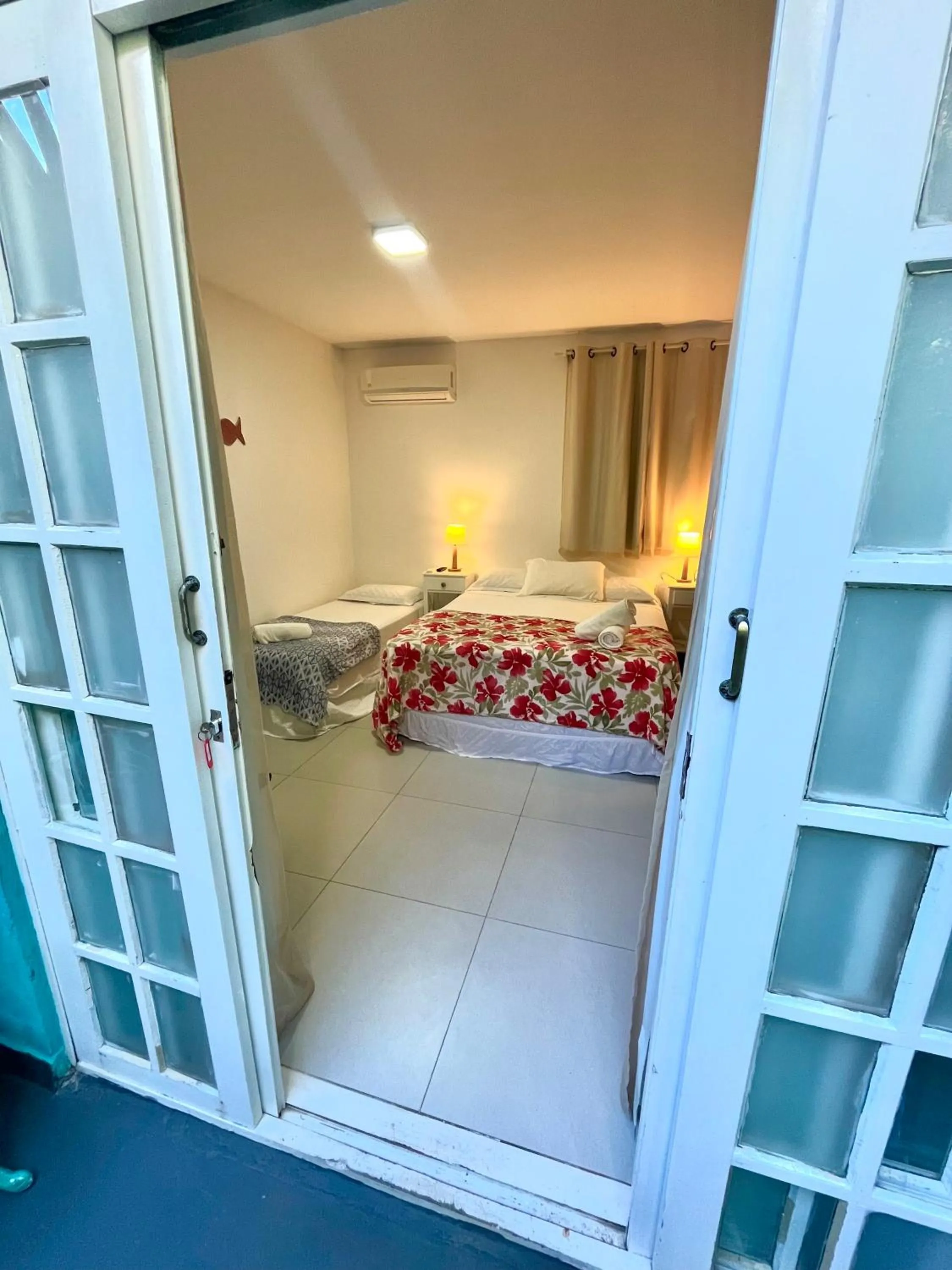 Bed in Pousada Tô na Praia Juquehy