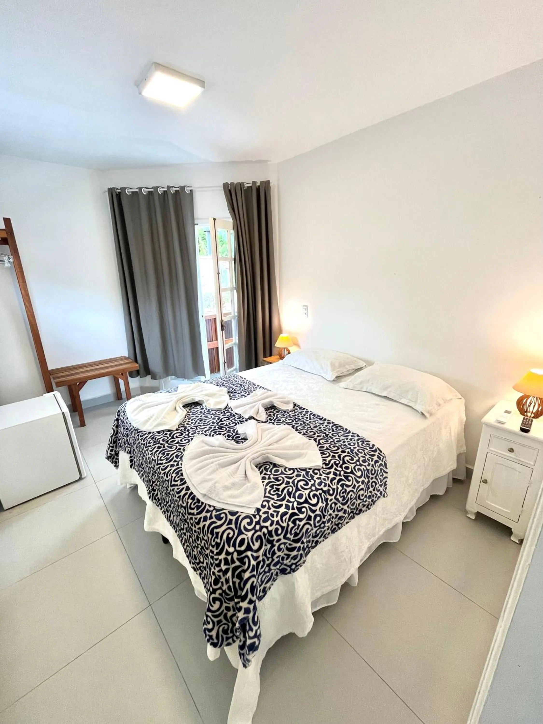 Bed in Pousada Tô na Praia Juquehy