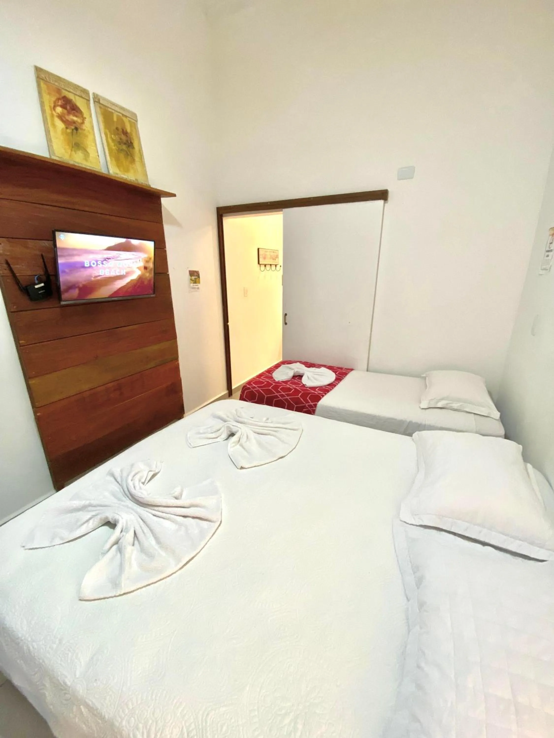 Bed in Pousada Tô na Praia Juquehy