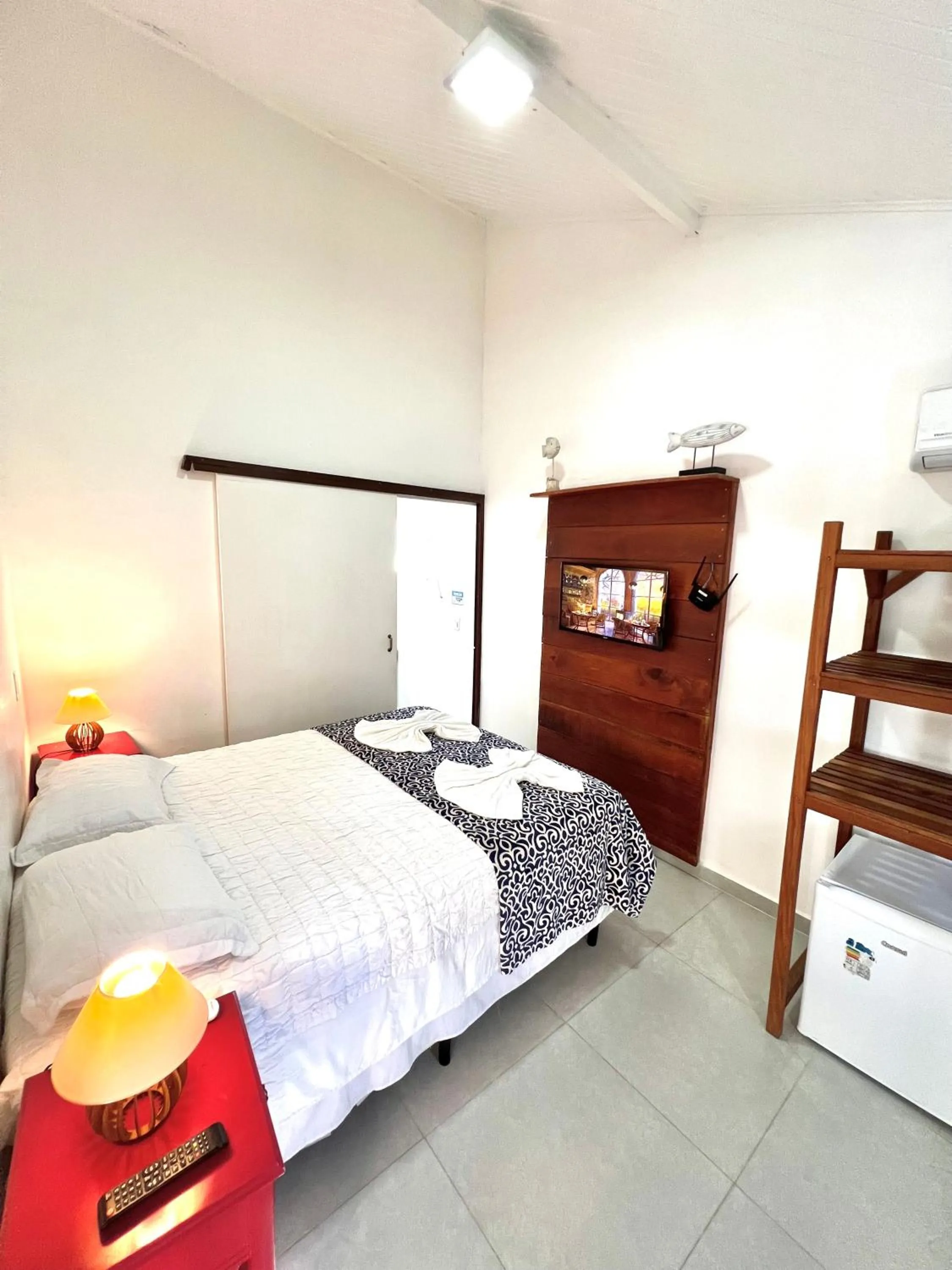 Bed in Pousada Tô na Praia Juquehy