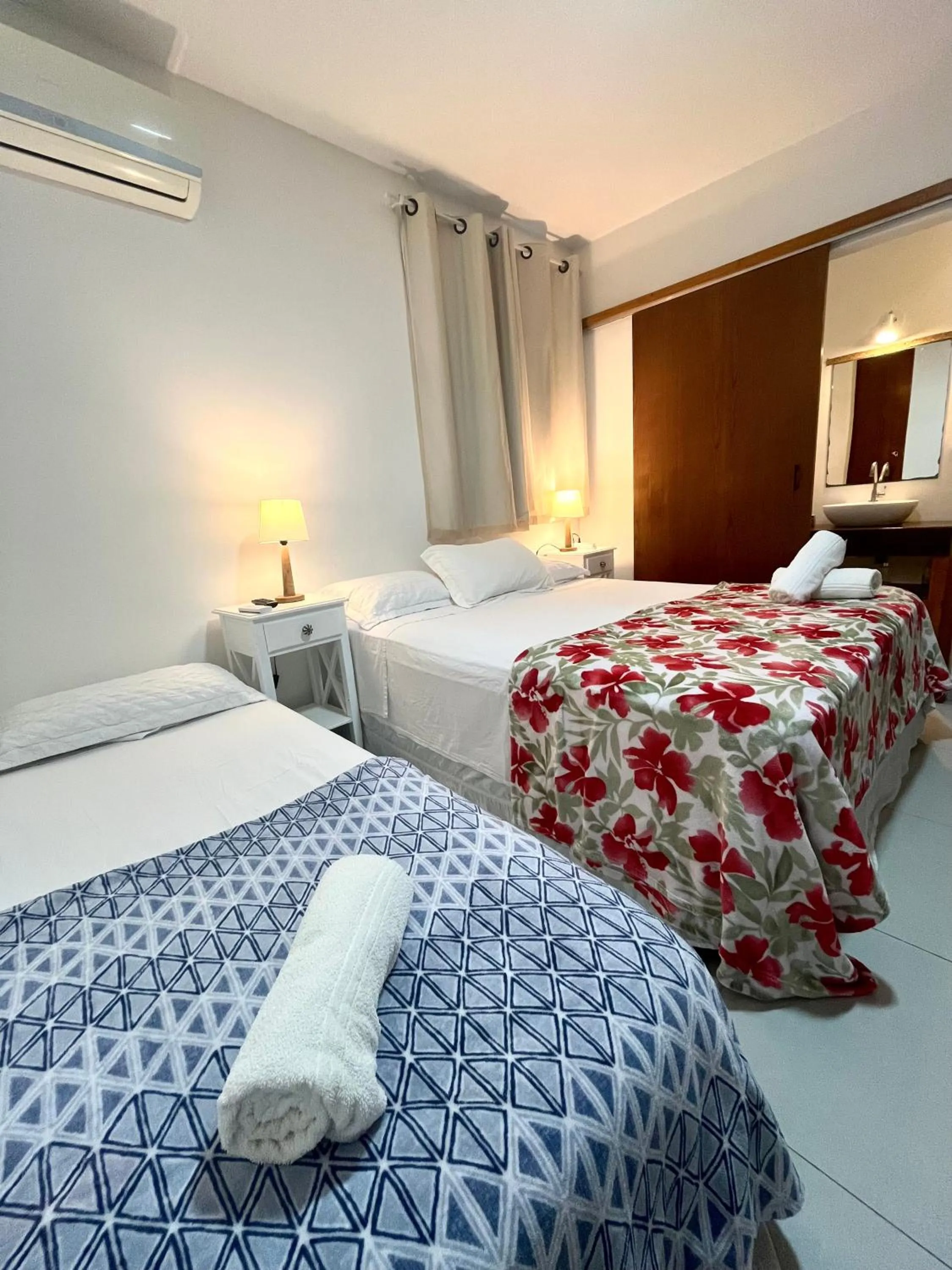 Bed in Pousada Tô na Praia Juquehy